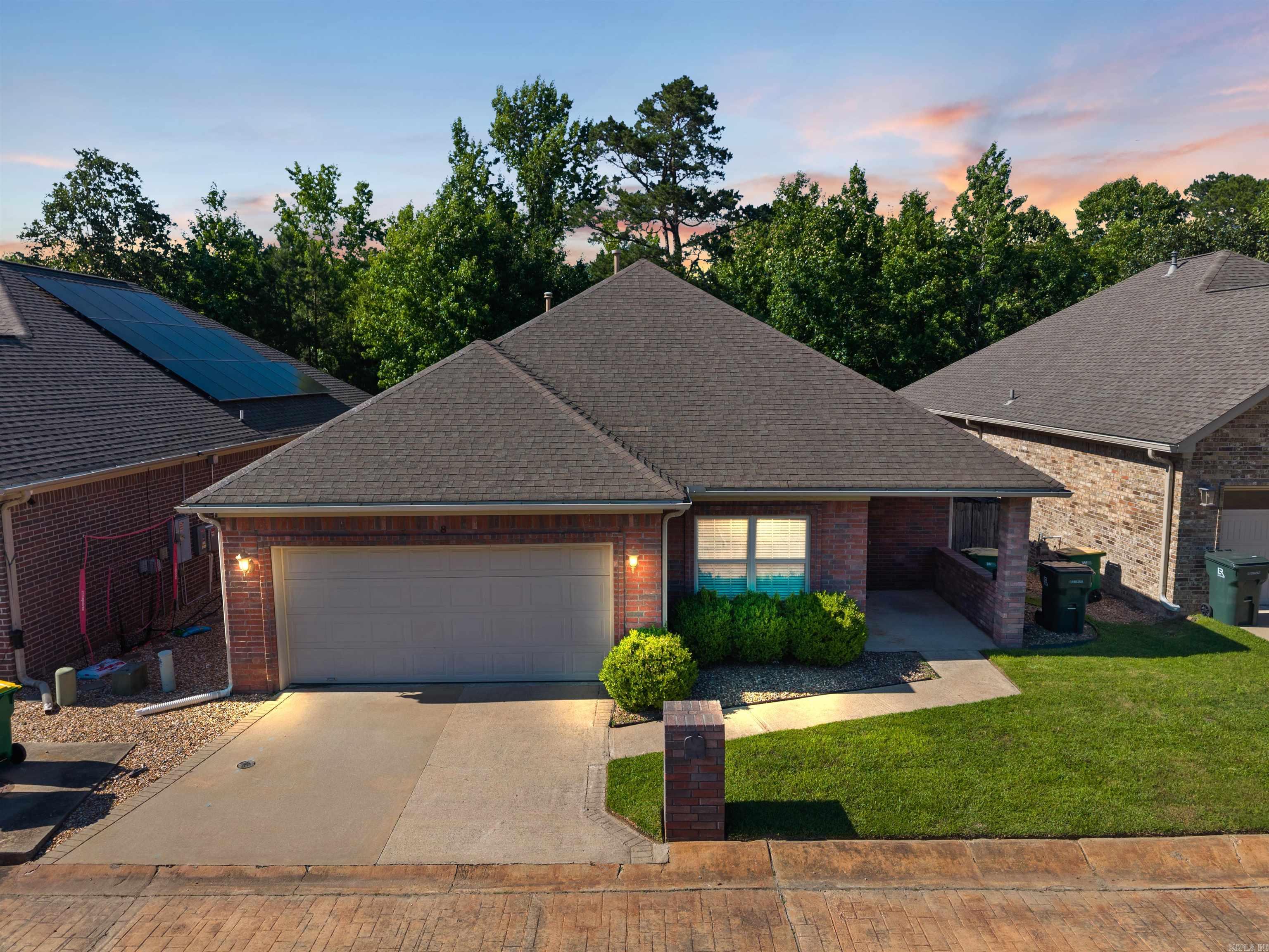 Welcome to 8 Pennsylvania Court—a well-maintained one-level home located in the desirable gated community of Governors Manor in West Little Rock. This charming home offers timeless curb appeal, a smart and functional layout, and inviting indoor and outdoor living spaces. The open-concept design is filled with natural light and features hardwood floors, vaulted ceilings, and a gas fireplace in the great room. The kitchen is equipped with an electric Jenn-Air range, GE Profile refrigerator, Kenmore dishwasher, GE microwave, disposal, and a cozy sitting area—perfect for morning coffee. Just off the great room is a flexible bonus room ideal for an office, craft room, or playroom. The private primary suite includes two walk-in closets, direct access to the covered back porch, and an ensuite bath with dual vanities, jetted tub, walk-in shower, and private water closet. Two additional bedrooms offer ample space for guests or family. Additional features include a two-car garage, laundry room, covered front and back porches, and a fully fenced backyard. Conveniently located near shopping, dining, and healthcare. Schedule your showing today!