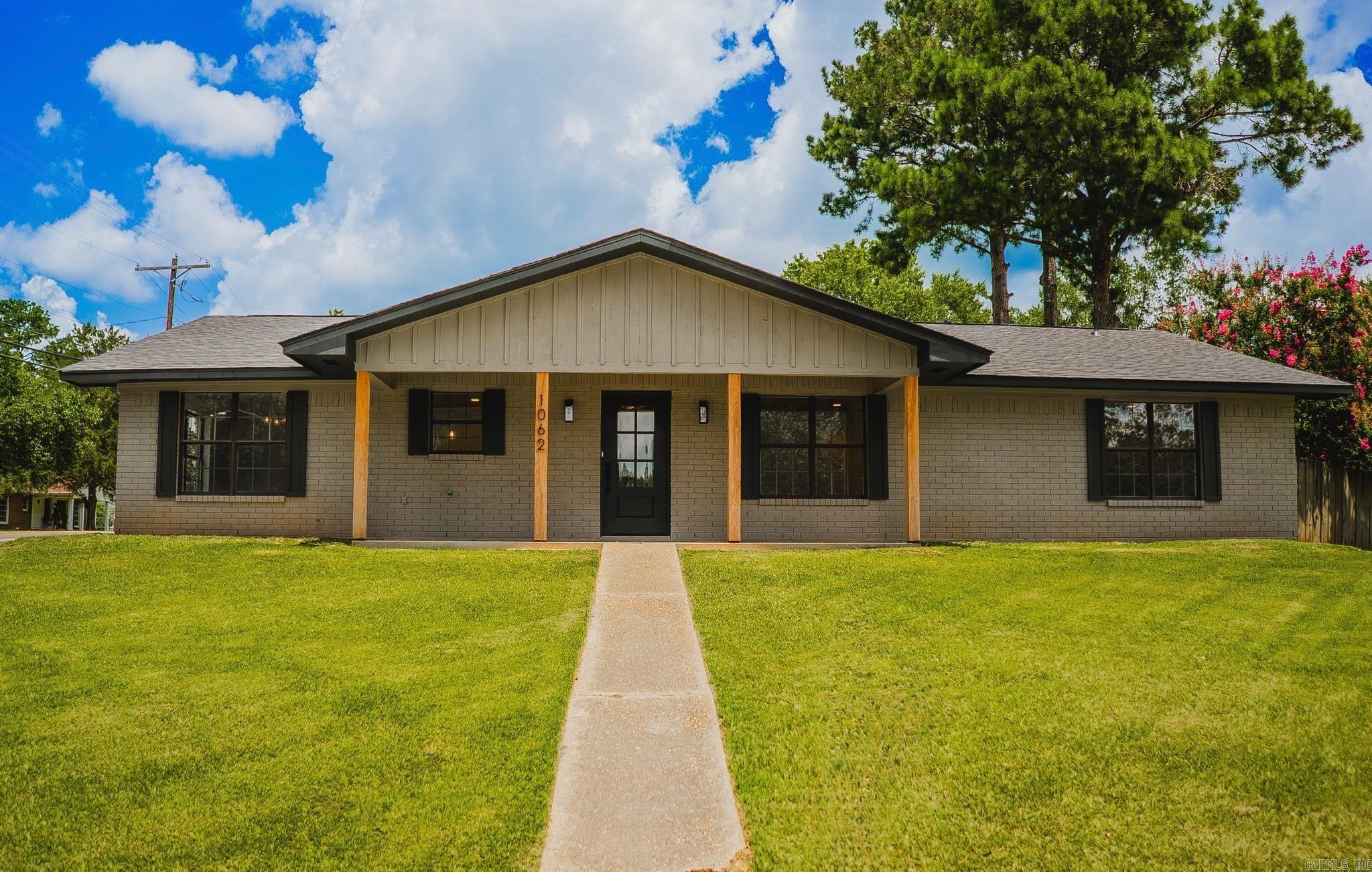This beautifully renovated 3-bedroom, 2-bath home offers 2,228 sq ft of stylish living space. Enjoy wide-plank LVP flooring throughout the main areas, fresh interior and exterior paint, all new doors, recessed lighting, updated fixtures, and high-end finishes. The living room features a cozy fireplace framed by elegant arched openings leading to a custom kitchen with granite countertops, stainless appliances, all new cabinets, a custom backsplash, and a spacious island. The bathrooms shine with beautiful new tile, modern vanities, and designer fixtures. The primary suite includes two closets and a spa-like en-suite bath. Generous guest bedrooms offer plenty of storage. Major updates include new plumbing, electrical, roof, and a tankless water heater. Outside, youāll find fresh custom woodwork, a large fenced yard, a concrete patio, and a 2-car carport with enclosed storage. Style, function, and comfortāthis one has it all! Donāt miss your chanceācall today to make it yours!