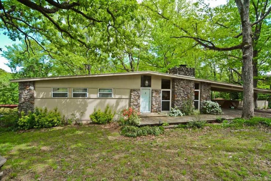 Oversized not overpriced!  Plenty of room for everyone and everything. A stone pavilion-type deck overlooks a back yard that is like your own private park.  Two bedrooms/two baths upstairs, one bedroom/one bath downstairs.  Downstairs bonus space could convert to mother-in-law space, or 4th bedroom. Granite kitchen tops.  Hardwood floors throughout main level. New TPS roof in 2012 Unfinished sunroom not counted in square footage.  Three outside storage rooms. Washer, dryer and fridge stay.