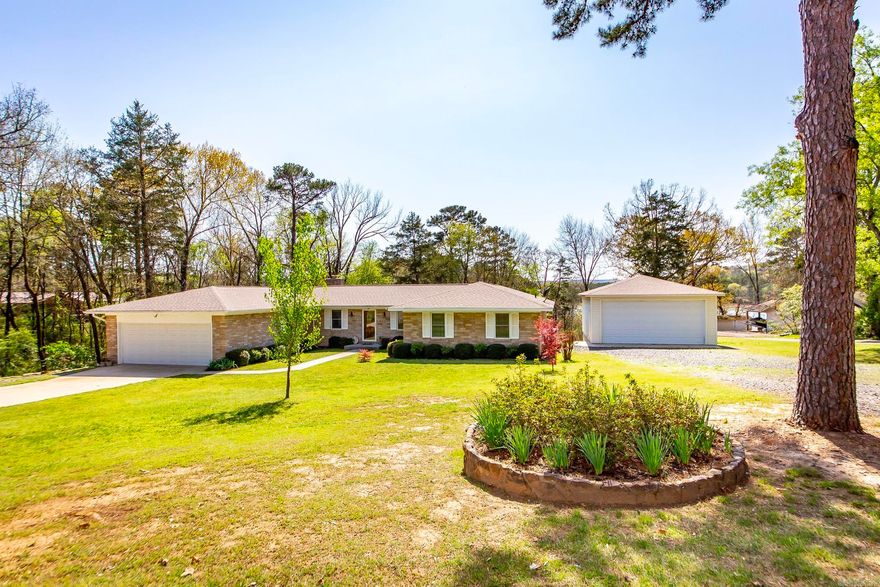 This beautiful, well-kept home is one level with a walkout finished basement and on the water! Located in the tranquil, sought-after subdivision of Interlochen Estates in the heart of Greers Ferry Lake. Close to town and three local marinas! No need for paying for boat storage with the additional detached shop was built 4 years ago and large enough for all your toys! This 3 bed, 2 1/2 bath home has an attached two-car garage and many updates, including granite countertops in the open kitchen and brand new quartz countertops & fixtures in the baths. The roof was replaced 4 years ago, and more recently, a new HVAC was installed. The electric cookstove has a gas line run to it already if that is your preference. The gentle slope and easy walking path make it easy to hop on the boat! Landscaping is developed and low maintenance. The fireplace in the main living area has had an update with new stone & tile. This home is a must see! Contact me today for your showing.