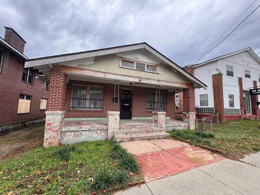 Opportunities exist with this solid building, lots of potential, located one block behind convention center. New roof, new electrical service. Call your agent today for an easy showing.