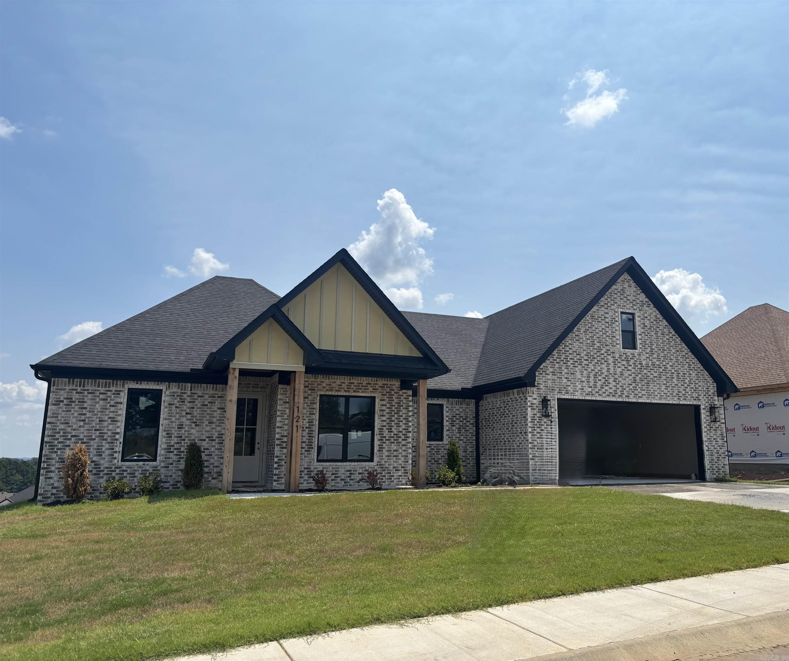 This home has a great view, covered back porch, extra landscaping! Two car garage, Home has LVP flooring, office, great room over looks kitchen with large island, wall oven, gas cooktop, extra large walk in pantry. Primary bedroom has custom ceiling . Primary bath has custom tile shower with free standing tub. Two other bedrooms have bathroom with double sinks. Bedroom upstairs with full bath.