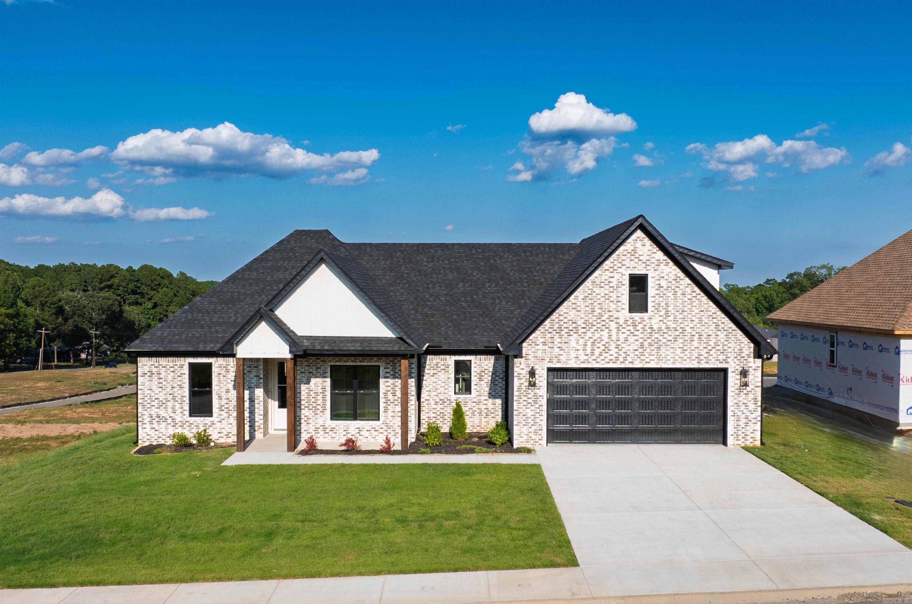 This home has a great view, covered back porch, extra landscaping! Two car garage, Home has LVP flooring, office, great room over looks kitchen with large island, wall oven, gas cooktop, extra large walk in pantry. Primary bedroom has custom ceiling . Primary bath has custom tile shower with free standing tub. Two other bedrooms have bathroom with double sinks. Bedroom upstairs with full bath.