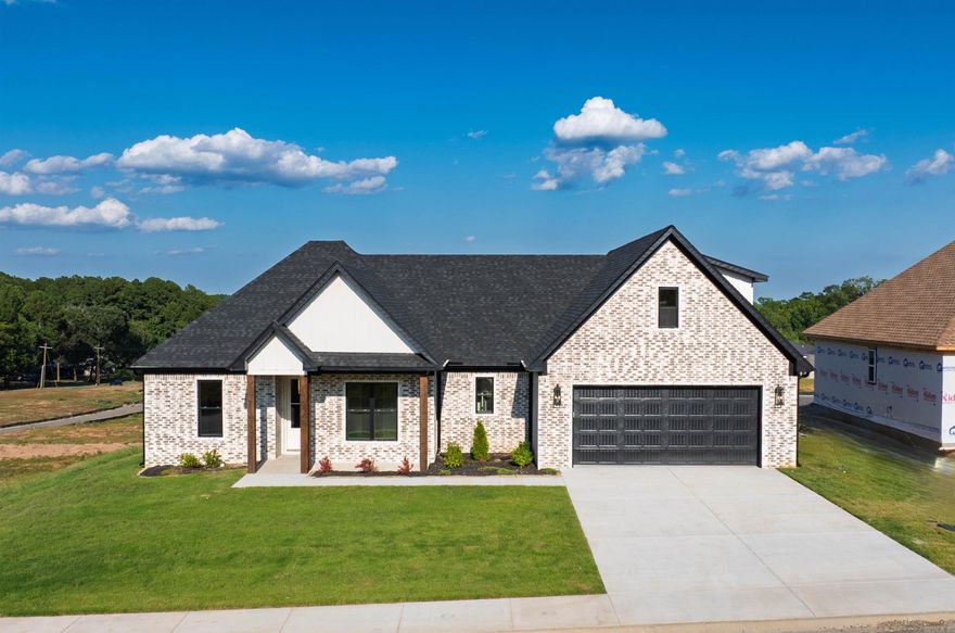 This home has a great view, covered back porch, extra landscaping! Two car garage, Home has LVP flooring, office, great room over looks kitchen with large island, wall oven, gas cooktop, extra large walk in pantry. Primary bedroom has custom ceiling . Primary bath has custom tile shower with free standing tub. Two other bedrooms have bathroom with double sinks. Bedroom upstairs with full bath.