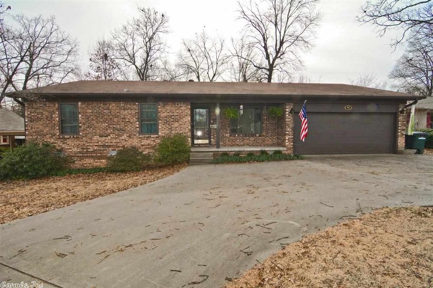 Very nice, pride of ownership. 3 Bedrooms, 2 bathrooms, 2 car garage home with circle drive for easy in and out. Features a large living room and dining room. Den with fireplace adds beauty of this home fro a second living area. Hardwood, carpet, & tile floors. The backyard is unbelievable oversized with storage building, .39 acres total.