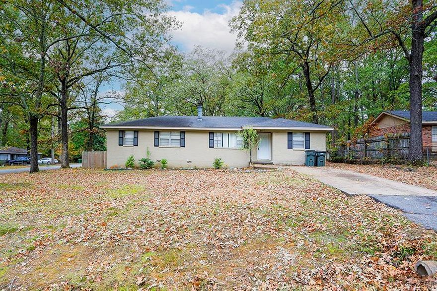 Traditional 4-bedroom family home on a large, fenced corner lot!  Open kitchen with dining, and a cozy living room with a fireplace.  En-suite primary bedroom with a full size bath.  Large shop in the back yard that could potentially be bonus living space. This is a wonderful opportunity to update and make your own or a great chance to own investment property.  This property is being sold AS-IS; there is no disclosure.  Agents, see remarks.