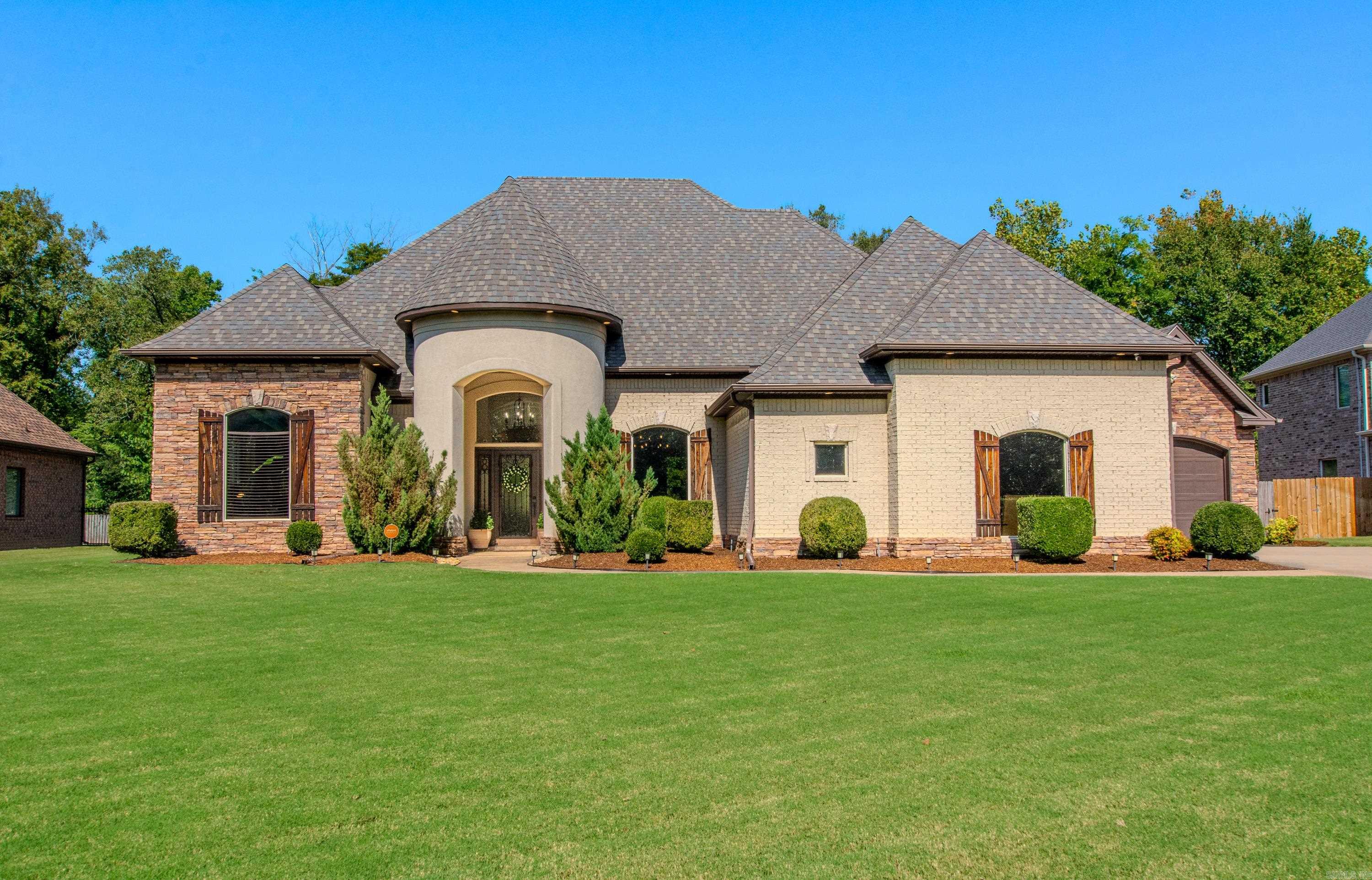 Discover this custom-built home on a .50-acre level lot in the prestigious Hurricane Lake Estates community. Thoughtfully designed for comfort and functionality, this property features a three-car garage plus a stand-alone basketball court, making it a rare find. Inside, the updated kitchen shines with double ovens, granite countertops, and a cozy breakfast nook. The great room with a gas fireplace opens to a second living area on the main level, creating space for both relaxation and entertaining. The primary suite offers a spacious walk-in closet, granite vanity tops, a jetted tub, and separate shower. Additional highlights include: Hardwood floors throughout the main living areas, Formal dining room perfect for gatherings, Dedicated office with built-ins, Upstairs bonus room or 4th bedroom for flexible use. The roof is only two years old. Flood insurance required.