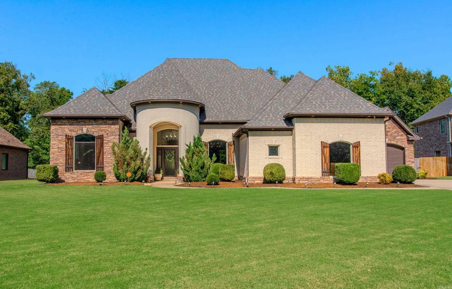 Discover this custom-built home on a .50-acre level lot in the prestigious Hurricane Lake Estates community. Thoughtfully designed for comfort and functionality, this property features a three-car garage plus a stand-alone basketball court, making it a rare find. Inside, the updated kitchen shines with double ovens, granite countertops, and a cozy breakfast nook. The great room with a gas fireplace opens to a second living area on the main level, creating space for both relaxation and entertaining. The primary suite offers a spacious walk-in closet, granite vanity tops, a jetted tub, and separate shower. Additional highlights include: Hardwood floors throughout the main living areas, Formal dining room perfect for gatherings, Dedicated office with built-ins, Upstairs bonus room or 4th bedroom for flexible use. The roof is only two years old.  Flood insurance required.