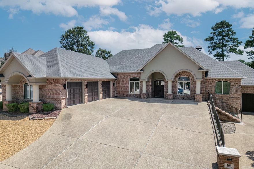 WOW will be your reaction as you enter the front door. OPEN GREAT ROOM, DINING, WET BAR and KITCHEN with high ceilings and massive wood trim. SOLID OAK FLOORING. Double oven. Gas connection piped for cooktop replacement if desired. Island w storage & bar stool seating. Beautiful OFFICE includes desk, credenza & hutch. Primary BED overlooks golf course w five-piece ENSUITE w jetted tub & walk-in shower. LAUNDRY off master closet & near garage. Split 3/2.5.  Solid wood 7-foot doors throughout house. Rounded corners. PATIO w two ceiling fans, Austin stone fireplace w gas logs, gas pipe for grill connection, receptacle for television connection above mantle, iron railing, a magnificent view of Isabella Nina #8 golf course & LAKE ISABELLA.  Professional landscaping includes strategically placed astroturf for a maintenance-free lifestyle. roof 2024.  Leaf Filter gutter guards 2023. Marathon 85-gallon water heater. washer & dryer GE Profile 2022. dishwasher KitchenAid 2022. new water pressure regulator. Stairs to attic. FOUR CAR GARAGE. RARE FIBEROPTIC wi-fi. HSV is USA’s largest gated community covering 26,000 acres w over 500 miles of paved streets. 9 golf courses & 11 lakes.  schedule.