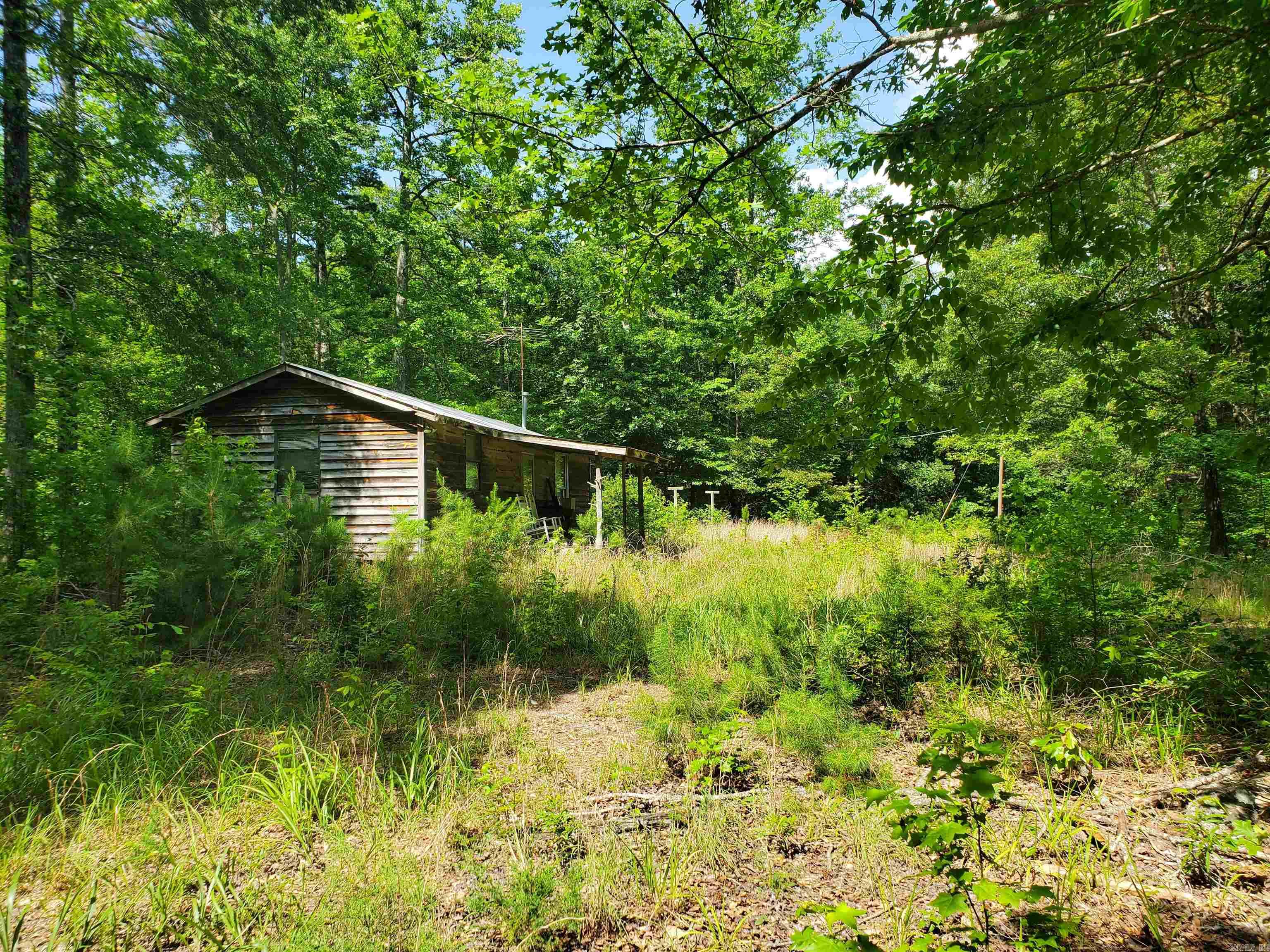 64+ Acres Near - Close to 4-Wheeling Trails & Ouachita River – Outdoor Paradise! Ready to own your own slice of adventure? This 64+ acre wooded property is a dream come true for outdoor enthusiasts and nature lovers alike! Wooded & Secluded – Enjoy privacy and natural beauty with trees throughout. County Road Frontage – Easy access to your property year-round. Near 4-Wheeling Trails – Perfect location for off-road fun! Minutes from the Ouachita River – Great for fishing, kayaking, and relaxing by the water. Pond on Property – Attracts wildlife and adds to the scenic charm. Older Well – Already in place (condition unknown, ready for your inspection). Shed/Storage – Older structure for tools, gear, or future improvement. Whether you're looking for a weekend getaway, hunting land, or a place to build your dream cabin, this property offers endless possibilities