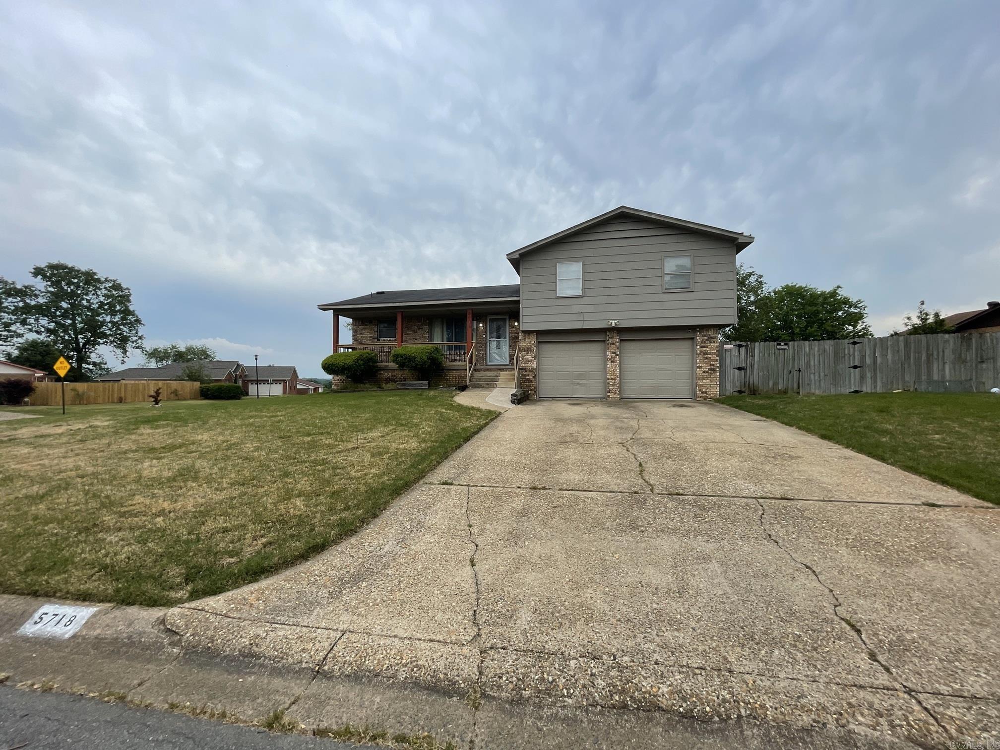 Beautiful tri-level home situated on a large corner lot in the well-established neighborhood of Pecan Lake. With a little TLC and a good vision for minor home repairs and projects, a new family can create their own style and update this three bedroom and two and one-half property. There is an above ground pool and jet tub on the multi-level deck to help make family gatherings a fun time for everyone. The neighborhood of Pecan Lake offers a nice community park, community garden and lake where many great family memories can be created that will last a lifetime. Home is being sold “as-is” with no Seller repairs. AGENTS: See Confidential Remarks