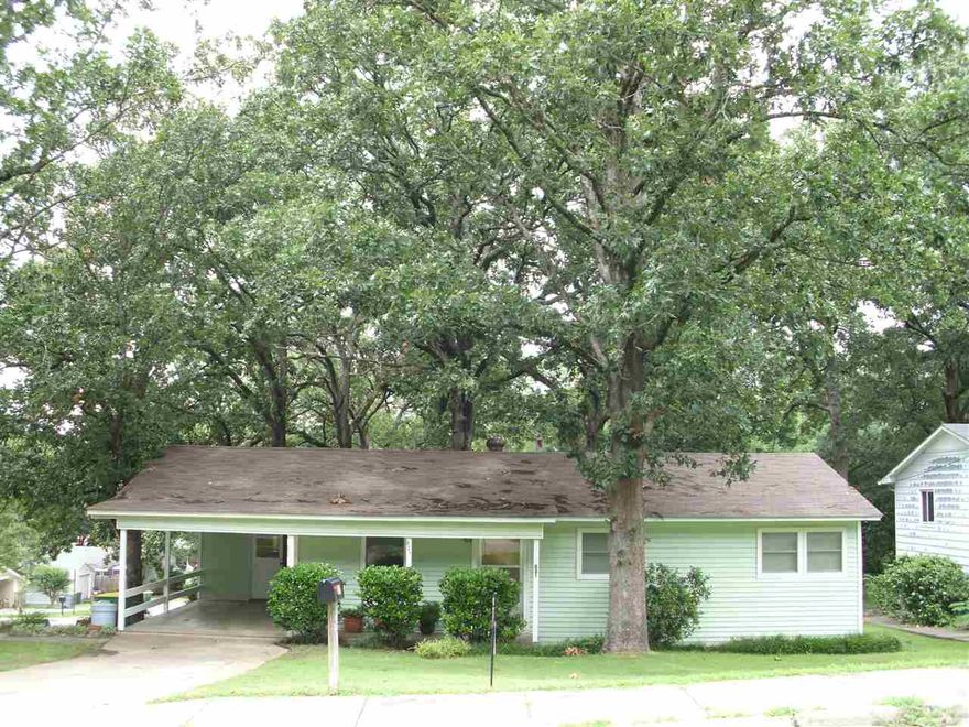 This home has a lot of CHARM! Only 1 Owner! Kitchen was updated in 2014 with new cabinets, gas stove, dishwasher, sink, counter tops, and pull out shelves!!! Large pantry!Original hardwood floors! New Roof in 2013! New Windows in 2014! Large utility/laundry room off the carport. This is a MUST SEE!  Investors welcome! Sq ft approx please measure.