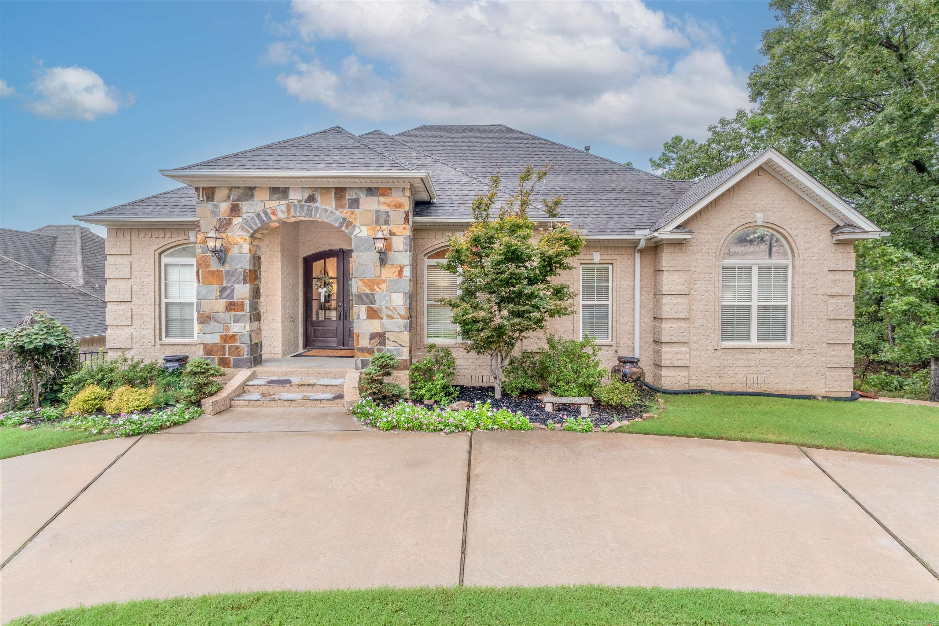 Majestic vista view of Pinnacle with spectacular sunsets from kitchen, all 3 living areas and primary bedroom. Flexible floor plan for large family or in-law qtrs downstairs with large bonus/family room, 3 BR and 2 full baths(one ensuite). Main level features family room (currently used as game room/pool table) plus a huge, open concept hearth room with eat in kitchen including breakfast bar, separate dry/coffee bar and pantry plus a large laundry room with lots of storage.Separate dining room (currently being used as office) is also located on main floor as well as a bedroom and full bath in addition to the primary BR suite. There are two new covered decks, (upper and lower),a fully enclosed iron fence in the back yard, new roof and most of the interior has been painted recently. You must see this beautiful home to fully appreciate all the extras...and the VIEW is indescribable. Book a showing today!