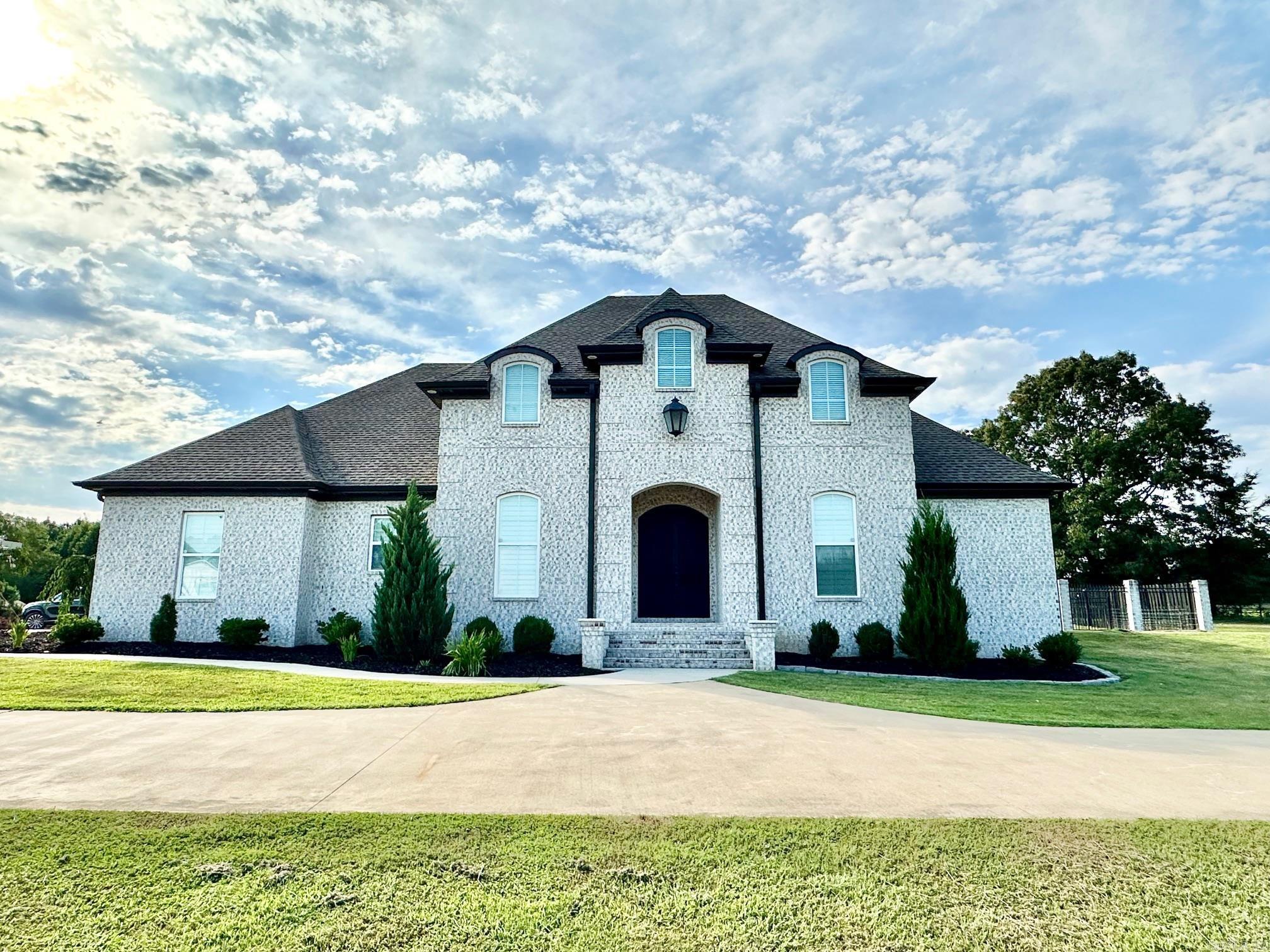 Need space? With over 3500 sq ft, five bedrooms, and four full baths space is exactly what you'll get! Like to entertain? Whether you enjoy grilling and watching the game on the covered back patio while your guests play in the in-ground saltwater pool or staying cool while cooking up some tasty bites in the smart kitchen, this home truly has all your entertaining needs met! Other amenities to this amazing property include: tall, vaulted ceilings in the primary bedroom. Primary bedroom also features a large walk-in closet, spacious private bathroom with soaker tub, walk-in shower complete with a rain head, and double vanities! The smart kitchen showcases a gas range and griddle, a built-in wall oven and microwave, Frigidaire Professional Series built in side by side refrigerator/freezer combo, touchless sink faucet, soft close cabinetry, under cabinet lighting, breakfast bar, walk-in pantry with automatic lighting and an eat-in kitchen/breakfast area. The large laundry room is complete with built-in cabinets,ample storage, built-in ice maker, and automatic lighting. Upstairs you will find a wet bar, a second living space or game room, a full bathroom and the 5th bedroom!