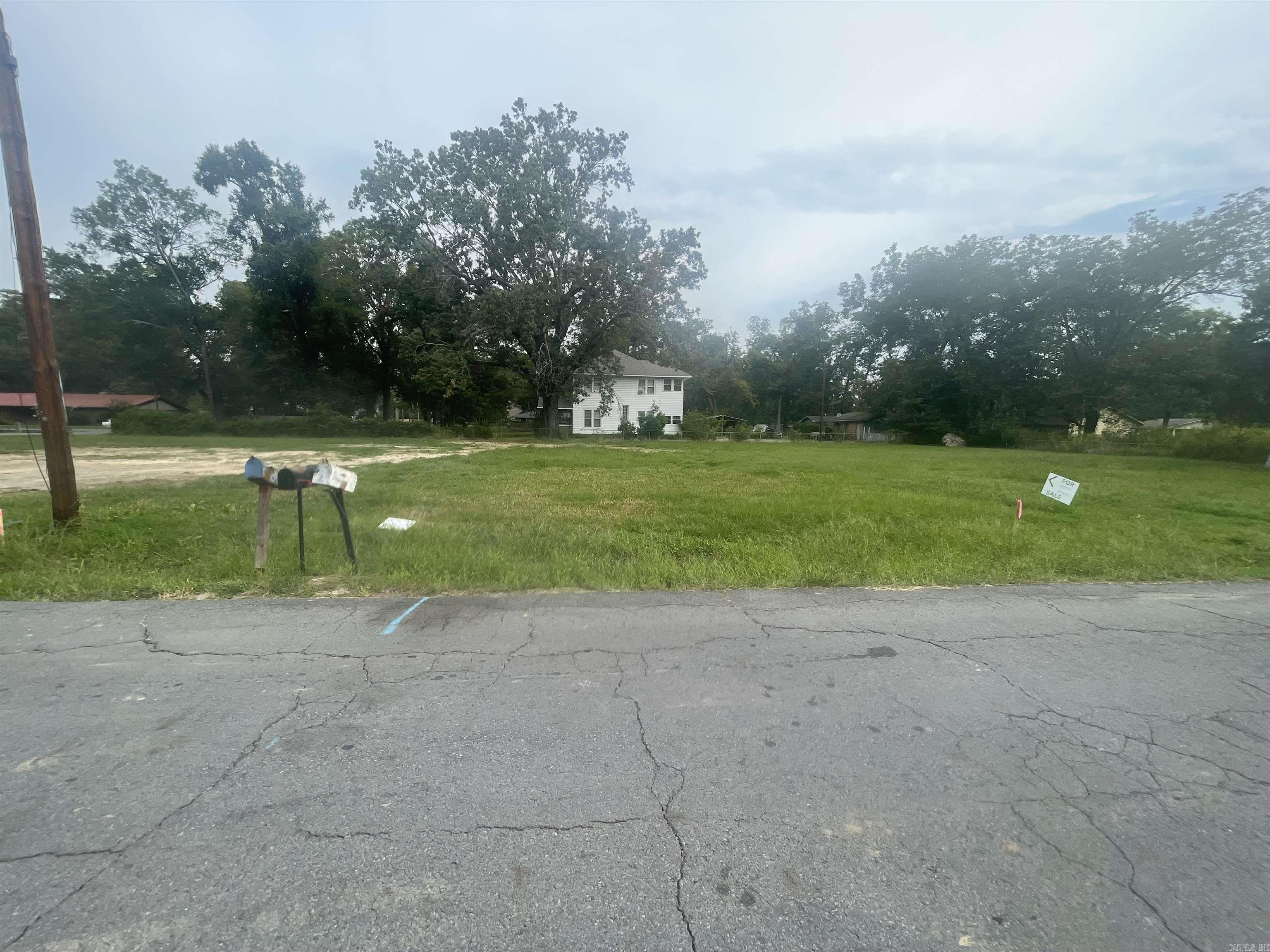 Beautiful level lot ready for your home to be built on, purchase and let us help Iron Hog Construction.