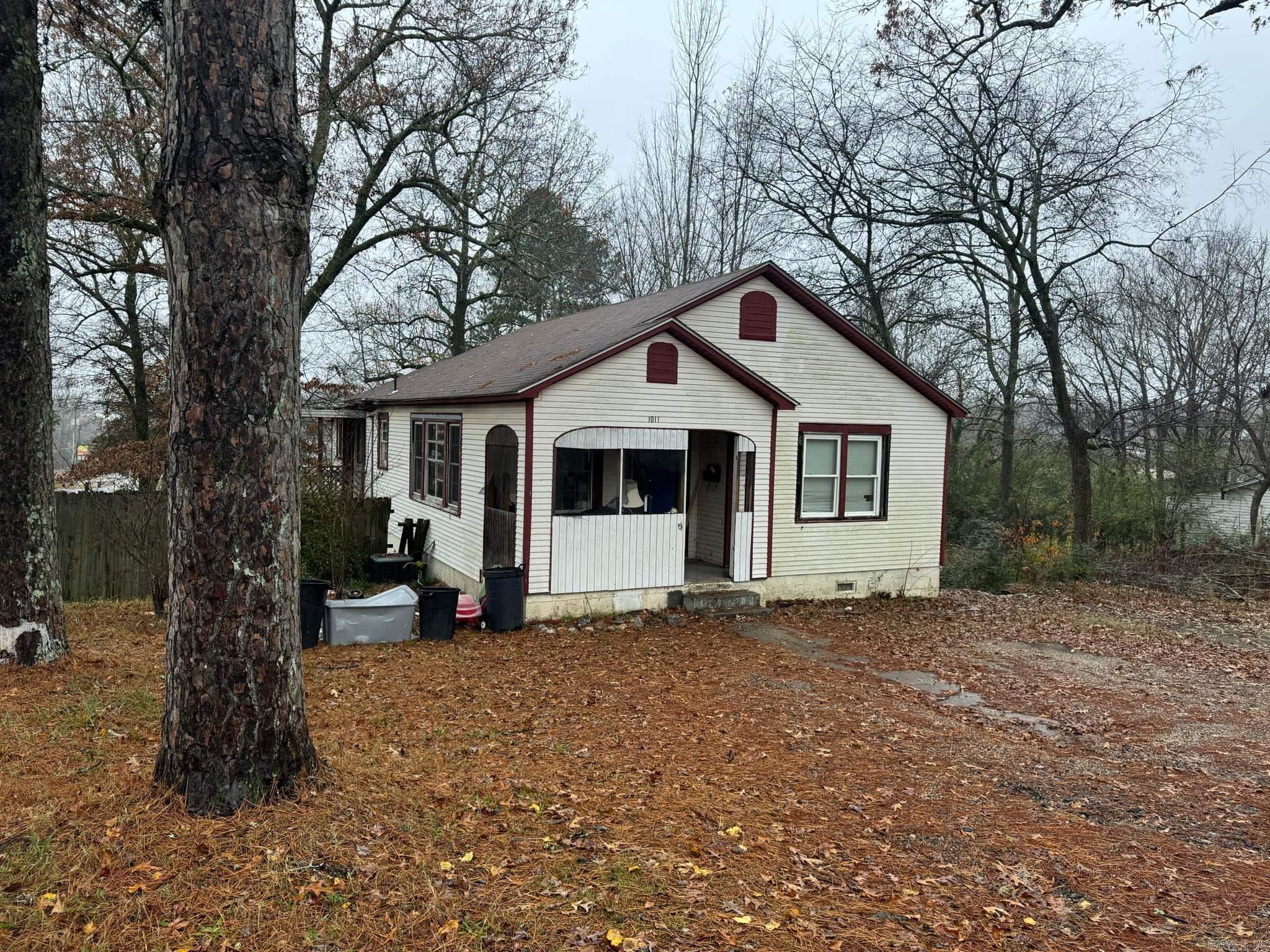 This 4-bedroom, 1-bathroom home in Mena, Arkansas, offers a great opportunity with plenty of space both inside and out. The home features a spacious living area and four good-sized bedrooms, providing ample room for comfortable living. One of the highlights of this property is the extra lot that comes with it, offering additional outdoor space for gardening, play, or potential future development. The yard is partially fenced, giving you some privacy and a secure area for pets. Located just a short drive from downtown Mena, this home is conveniently close to local shops, schools, and parks. Whether you're looking for a home with room to grow or an investment property with extra land, this property has potential. Schedule a showing today to see all that this Mena home and extra lot have to offer!