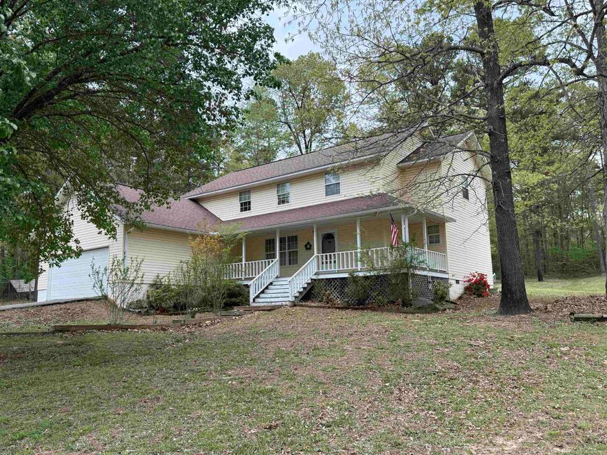 Looking for a large home in a well-established subdivision? This 5-bedroom, 2.5-bathroom home in the desirable Ashley’s Woods Subdivision in Melbourne, Arkansas offers the perfect blend of space, comfort, and convenience. The master bedroom with a bathroom is located on the main level, while four additional bedrooms and a full bathroom are upstairs—ideal for families of all sizes. The home features 2,340 square feet of living space, an attached 2-car garage, and a laundry room for added functionality. Situated on a generous 1.25-acre lot, you'll enjoy nice trees in both the front and back yards and a charming wrap-around front porch—perfect for relaxing and taking in the peaceful surroundings. The property also includes a dog kennel, making it ideal for pet lovers. This home is move-in ready and priced to sell at $239,000. Don’t miss this opportunity to own a spacious home in a beautiful subdivision close to local schools, shopping, and amenities.