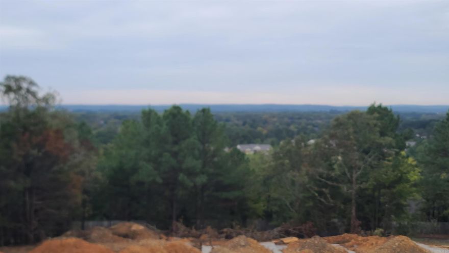 Conway View Property.  Easy Access to I-40 at Salem Street.  Property is presently wooded.  Owner is in the process of clearing the property to open up the view.  Picture of the view is from the lot next to this property.