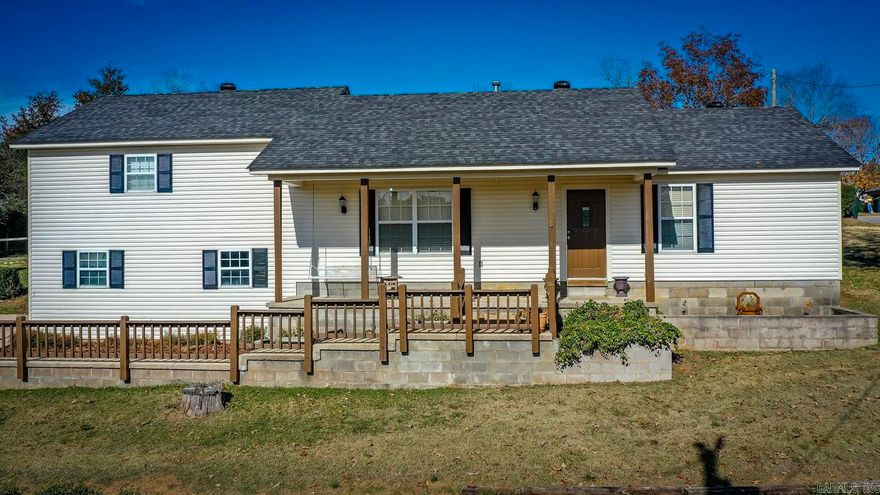 Convenient location that is close to schools, churches, and main part of town and by-pass.  You can sit in the swing on the front porch and enjoy the view in the valley.  Home has just had new flooring in almost every room. The new flooring is LVP 100% waterproof.  Two-car garage has new sheetrock and peg board and painted.  Upstairs bathroom has new vanity and commode.  Has fenced back yard for your pets and children.