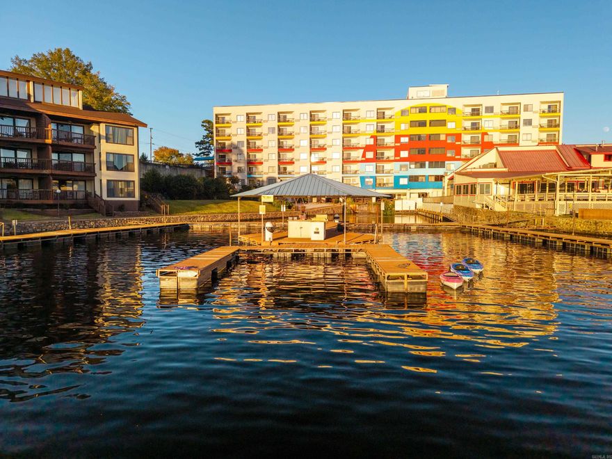 Welcome to your perfect getaway destination at Sunbay Resort, nestled near the serene shores of Lake Hamilton. This gorgeous, ground-level condo comes fully furnished, move-in ready, and wheelchair accessible! Offering 2 bedrooms and 2 bathrooms, it combines comfort and style with beautiful views and all the amazing amenities Sunbay has to offer—including a pool, hot tub, public boat dock and kids play area. Ideally located just steps from the lake, minutes from Historic Oaklawn Racetrack, and across from the new Hamilton Hangout, this condo is perfect for relaxation and adventure alike. Currently operating as a successful short-term rental with an active STR license and impressive Airbnb history, it’s a fantastic turn-key investment or private retreat. Whether you're lounging in the cozy living area or preparing a meal in the well-appointed kitchen, every detail exudes comfort and convenience. Don’t miss your chance to own this slice of paradise—where every day feels like a vacation! POA Dues are $245 per month and include electric, water, and cable!