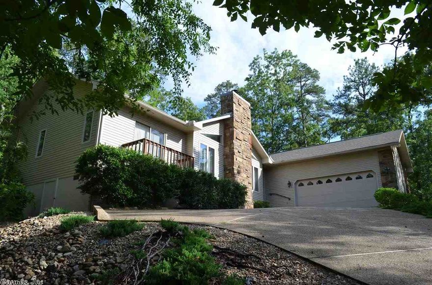 This one says Welcome Home the minute you enter! 1 owner, 1 level, w/ split floor-plan flowing happily in all directions.  Lovely sun-room, deck, & balcony to enjoy the lovely lake & woodsy views & local wildlife. Not too big, not too small!  Extra interior insulation for sound proofing. Low utilities. All custom cabinetry.  Accent lighting, trey & vaulted ceilings, bullnose drywall corners, & floored attic. Extra wide driveway with turn around area for easy access and exit. Centrally located! Don't miss!