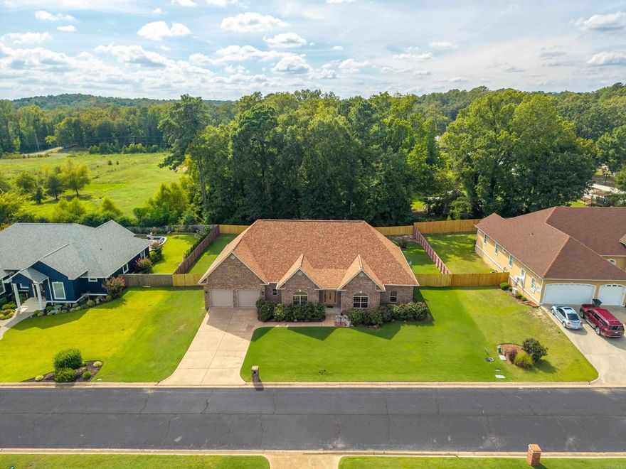 Welcome to this spacious 3 BR., 2.5 BA. home nestled in one of Hot Spring's most desirable neighborhoods. This generous 3,146 square foot residence offers the perfect blend of comfort and functionality with its thoughtful split floor plan that provides privacy and separation between living spaces. The home features a dedicated office space, ideal for remote work or study sessions, while the oversized laundry room makes household chores surprisingly manageable. Step outside to discover your own private oasis with a fully fenced backyard that's perfect for entertaining, gardening, or simply enjoying morning coffee in peaceful seclusion. Located conveniently near shopping and quality schools, this property offers both suburban tranquility and urban accessibility. The well-designed layout maximizes every square foot, creating distinct areas for relaxation, work, and play. Whether you're hosting dinner parties or enjoying quiet family time, this home adapts beautifully to your lifestyle needs while providing the space and privacy that today's families crave.