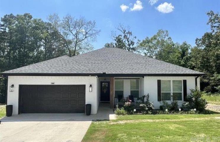 ALARM SYSTEM, TOUCHSCREEN REFRIGERATOR, CAMERA SYSTEM, AND TV MOUNTS TO CONVEY. OPEN FLOOR PLAN, FIREPLACE, GRANITE, LUXURY TILE, AND MUCH MORE. MOVE IN READY! BRING ALL OFFERS!
