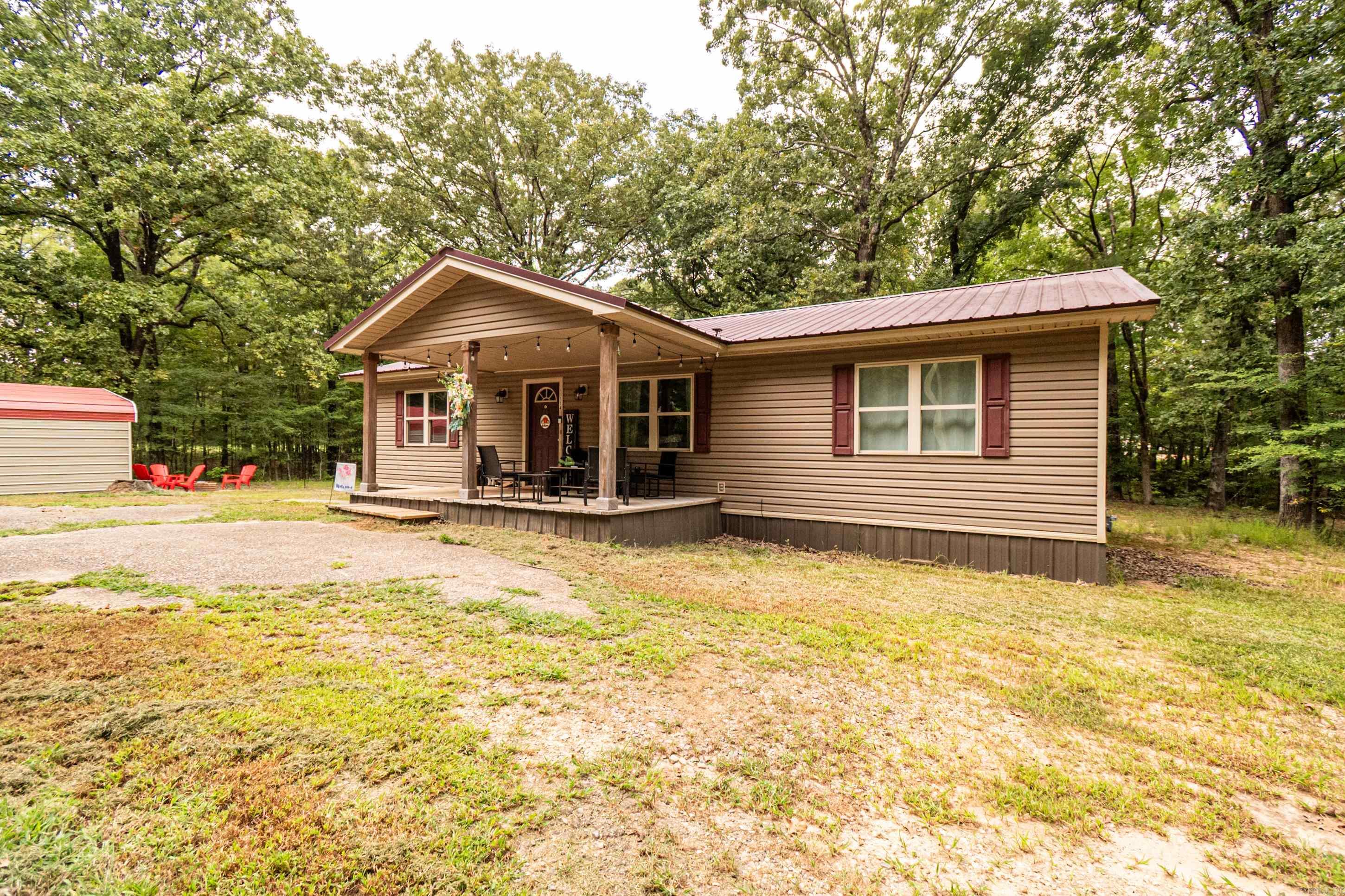 Home with great location just south of town. Close to the college but still allows you plenty of privacy with 4 acres.Also very easy access to the bypass that can take you to Mcgehee or Arkansas city. New floors installed last year, along with fresh paint. Property has a nice shed with electricity. Come check out this place for yourself to see how you can make this house your home!