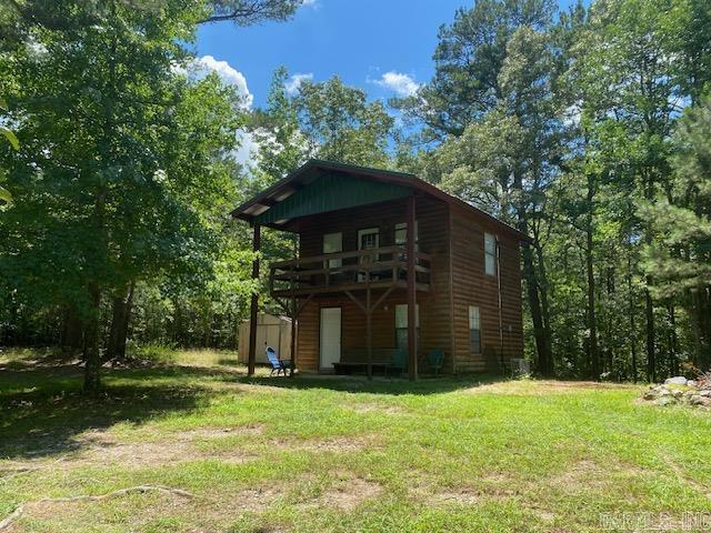 Dreaming of a cabin in the woods? Here you go! This 2 story, 1 bedroom, 1 bath adorable log-sided cabin with a balcony is just what you need. Sits on this small acreage and is close to the Wolf Pen Gap trails. Right down the road is Big Fork Creek. Public access is just 1/2 mile from the driveway.