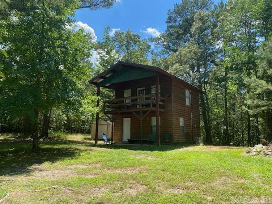 Dreaming of a cabin in the woods? Here you go!  This 2 story, 1 bedroom, 1 bath adorable log-sided cabin with a balcony is just what you need. Sits on this small acreage and is close to the Wolf Pen Gap trails. Right down the road is Big Fork Creek. Public access is just 1/2 mile from the driveway.