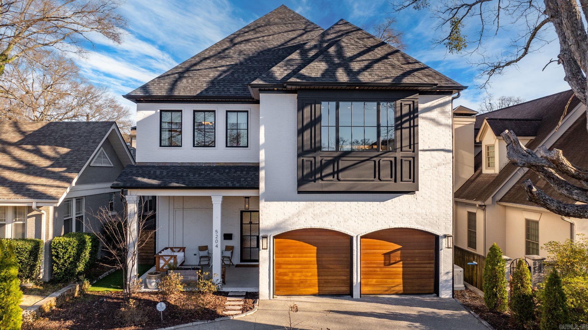 Beautiful newer construction in the heart of the Heights! Clean line design with exceptional detail. Exquisite chef's kitchen with top-of-the-line appliances and custom cabinetry, large island with storage and seating and double oven gas range, wall air fryer, and an enormous fridge. Fantastic pantry with office nook at the entrance. The spacious family living has a gorgeous fireplace, beautiful flooring and access to the covered terrace over looking the pool and hot tub. Incredible outdoor living space including an outdoor kitchen area. The backyard is turf, so very little maintenance needed. Guest suite on the main level (sellers currently using as exercise room with a murphy bed) with full bath. One of two laundry areas near the garage entrance. Upstairs: Amazing primary suite with luxurious bathroom and spectacular closet. Office with glass cabinetry. Two other large guest bedroom suites. Also an additional family sized laundry room. Fantastic media/game room with beautiful cabinetry. This home has tons of storage. Generator and a two car garage.
