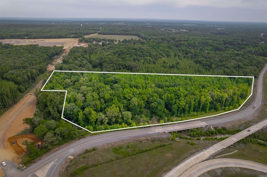 Location, Location, Location. This property has the location! Located primarily along N. Willie Ray Dr, this approx 13-Acre property has excellent marketing potential for signage and/or building commercial structures such as Hotels, Gas Stations, etc...  The sketch provided is NOT a Survey.  Utilities located at roads.  Official Legal Description, Acreage and Dimensions shall be defined by a New Survey.  The property has great long-term potential. SEE AGENT REMARKS.