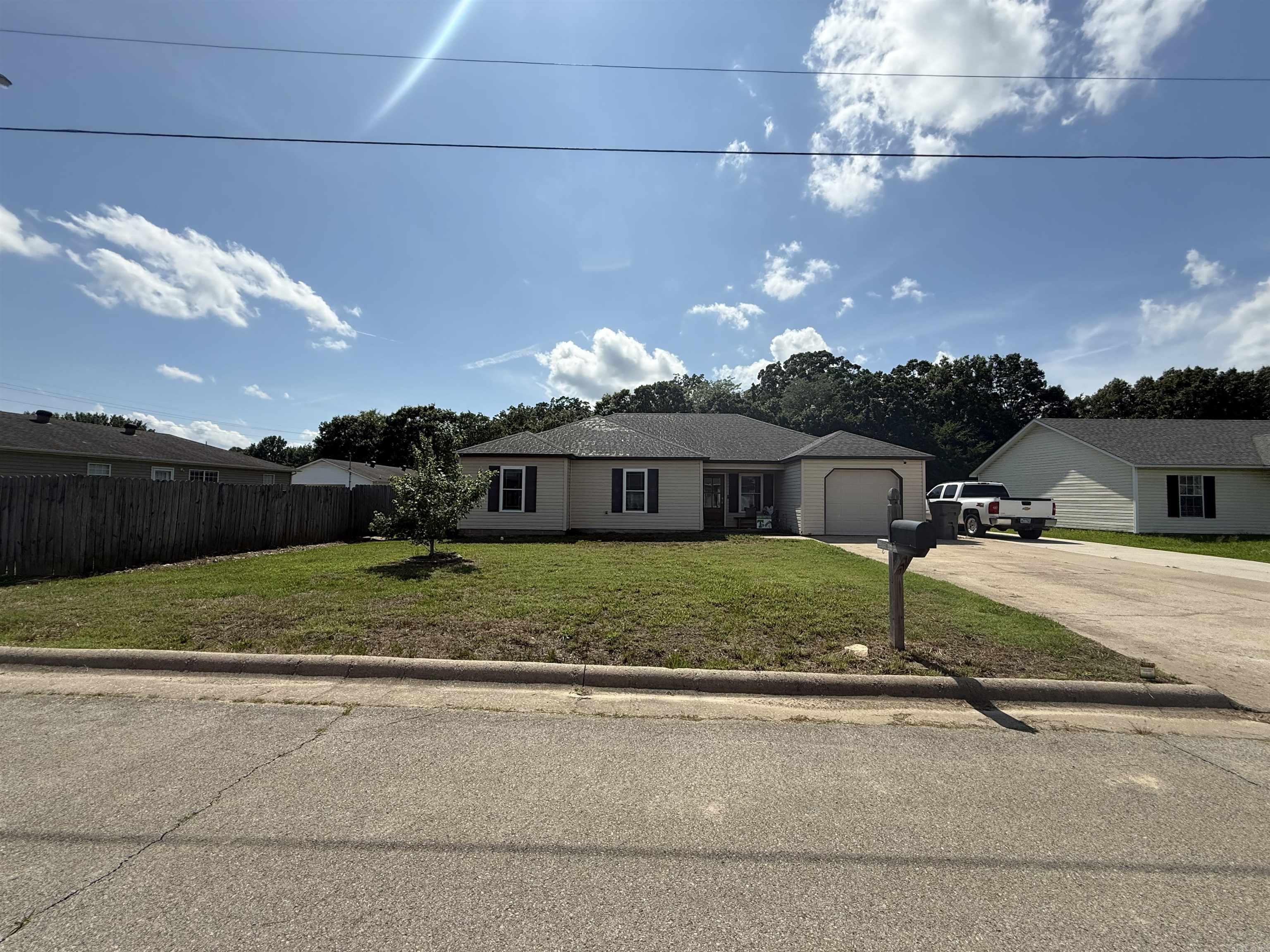 This 3-bedroom, 2-bath home at 608 Marion Street in Paragould is a great find with 1,461 square feet of living space sitting on a roomy 0.33-acre lot. It’s got a nice, easy layout with a comfy living room, a good-sized kitchen, and a dining area that works great for everyday meals or hanging out with friends and family. The primary bedroom has its own bathroom, and the other two rooms are perfect for guests, or even an office. There’s also a 1-car garage and a big backyard with plenty of space to relax, play, or start a garden. Located on a quiet street but still close to town, this place is a solid choice whether you're buying your first home or just looking for something simple and cozy.
