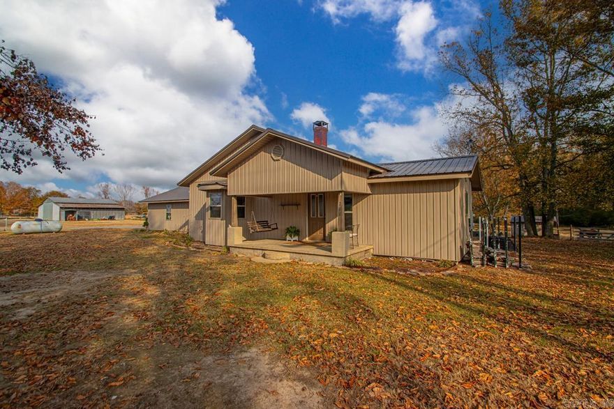 If you've been looking for a charming home on acreage in the Cabot School District, this is your chance! This cozy 3 bedroom, 2 bathroom home sits on approximately 11.99 acres and has all the major updates done for you. New metal roof (2022), new siding (2020), new windows (2020), and HVAC (2019). Across the yard, you'll have access to your horse barn with potential for up to 6 stalls - as well as tack room or workshop. Outside the barn you'll find an electric outlet for your camper or RV. The solar powered gate will provide safety and security for kids and pets. The property also features a storm cellar right out your back door for peace of mind. ***AGENTS SEE REMARKS***