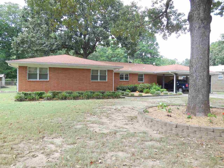 Nice 1 level brick has been well cared for! Huge oak trees! New roof in 2009, Pella windows tilt out in 2003, SS Appl - Gas cook top, Fridge, DW & Microwave in 2004. Fridge, Washer & Dryer & Riding Mower stay with house.  Nice brick workshop & storage building. Huge 16 x 20 Screened in porch. Hardwoods under carpet except in den (as per owner). Sq Ft came from Terminex drawing. 2 nice lots.- .39/acre level yard! Owner is in process of moving, so will be available at closing. Call CSS - 501-244-0333 to show