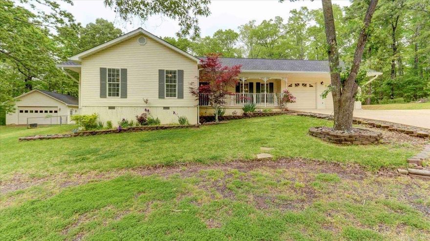 Newly updated home in Diamondhead.  This home is situated on a large lot with beautiful hardwoods surrounding.  New hardwood floors, fresh paint and trim work make this home feel new.  Enjoy the updated kitchen with new tile floors, beautiful granite counter tops, and updated backsplash. The den features floor to ceiling windows bringing the outdoors in.  This home features a large shop and additional garage that is heated and cooled.  Diamondhead is a gated community in the Lakeside School district that features an 18 hole PGA golf course, Olympic sized pool   ,basketball and tennis courts, playground and boat launch. Live the resort lifestyle and enjoy being close to Lake Catherine and all that Hot Springs has to offer.