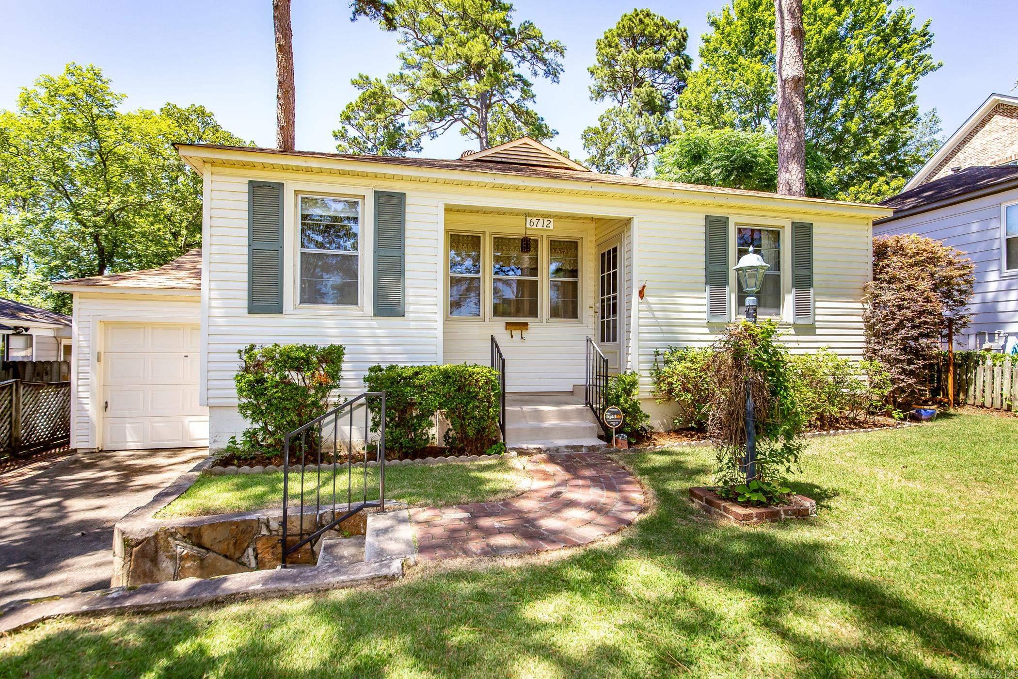 Come see this beautifully well kept home in highly desirable Cammack Village! Close to area schools, Cammack park & tennis courts and all the activities of the Rebsamen Park area. Incredible attributes of this Cammack cutie include: site built hardwoods, 2 living areas, whole house generator, central vac system, sanctuary-like backyard w deck and a massive workshop w water, electric, generator backup and air. Don’t miss your chance to make this fabulous home YOURS, schedule a tour today!