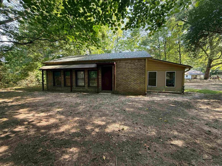 Discover peaceful country living just minutes from town! This charming 2-bedroom, 1-bath home offers approx. 1100 sq. ft. of comfortable space on a generous 1.71-acre lot in Clark County. Whether you’re enjoying your morning coffee on the porch or letting pets or kids roam the open yard, you’ll love the quiet surroundings and room to grow.  Inside, the home features a practical layout with updated flooring and neutral tones—ready for your personal touch. New central heat and air, new roof, new water supply, and new windows in sunroom, and easy access to major roads, this home blends convenience and comfort.  Perfectly located just outside Arkadelphia city limits, you’re a short drive from Henderson State University, Ouachita Baptist University, Baptist Health Medical Center, and all the shopping and dining downtown has to offer. Enjoy weekends on DeGray Lake, kayaking the Ouachita River, or exploring local parks and trails.  Whether you’re a first-time buyer, downsizer, or looking for a rural retreat close to town, this one is priced right at just $120,000!