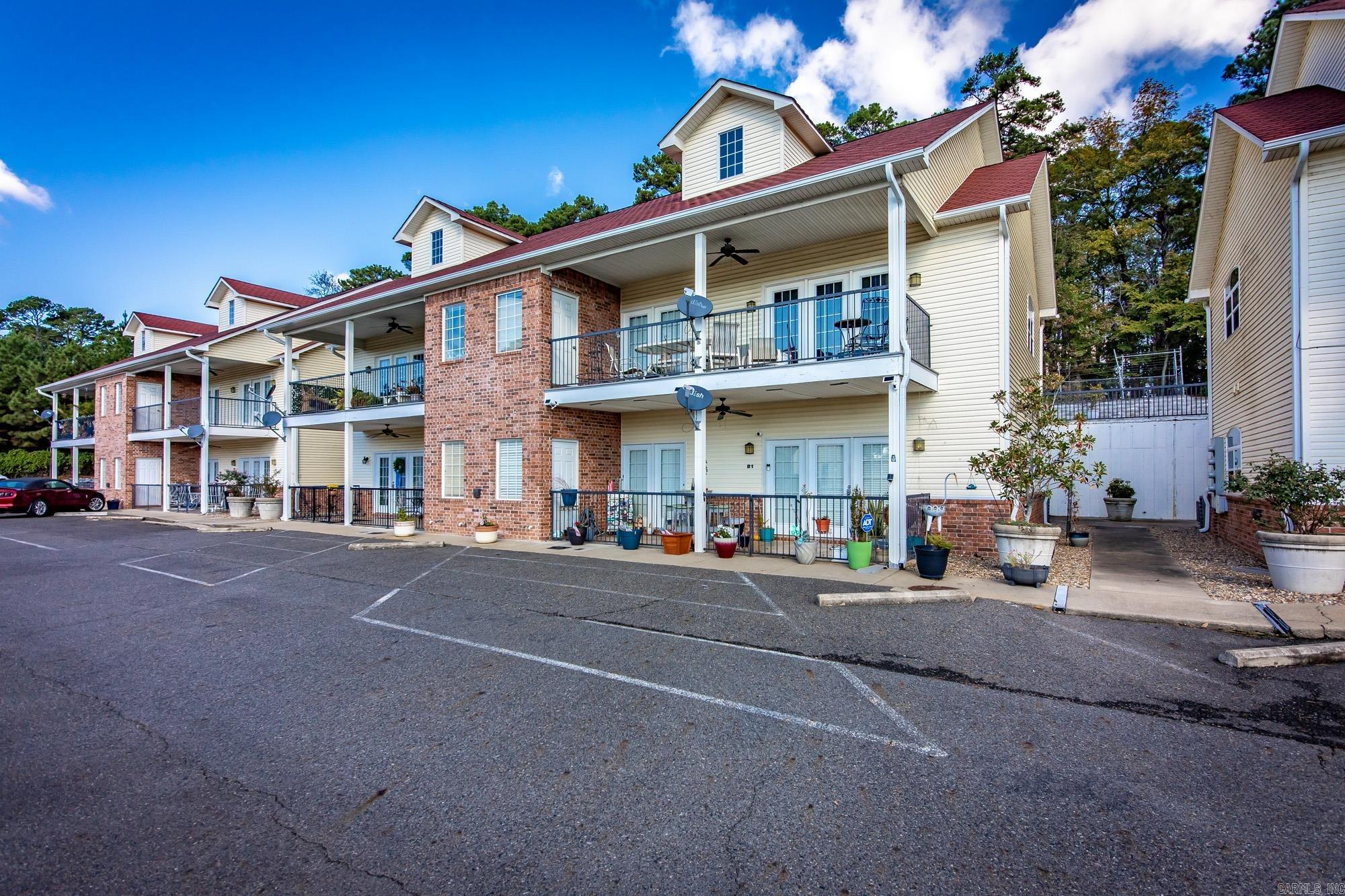 Lifeās better at the lake, and this 2-bed 2-bath condo comes with proof. Itās fully furnished, short-term rental licensed, and so turn-key it might start making money before you unpack. The covered patio has lake views made for coffee, cocktails, or contemplating why you didnāt buy sooner. Thereās even storage for all your lake-day gearābecause nothing says āinvestment propertyā like a perfectly organized float collection. Boat tie-ups are ready when you are, and the in-ground pool is ideal for pretending youāre āchecking emails.ā P&L statements are on file and the numbers look almost as good as the sunsets. Perfect for buyers who want to relax and investors who like a property that pays for their vacation habit.