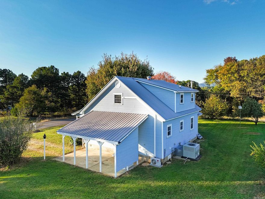 A true horse lover’s dream just minutes from town!  This peaceful 3 bedroom, 2 bath home sits on 20 rolling acres with a pond, well-maintained hay fields, and 15 acres of fenced pasture plus 5 wooded acres.  Equestrians will love the 180x70 sand arena and 60x40 barn featuring five 10x12 matted stalls, each with its own matted run-in. The barn also includes a tack room and electric, with 1,100 ft of pipe fencing connecting the barn and pastures for easy turnout.  A small workshop with concrete floor, electric, and a 30 amp RV hookup offers space for equipment or guests. Every detail of this property has been designed with horses and peaceful country living in mind offering serenity, space, and convenience just outside the city limits.