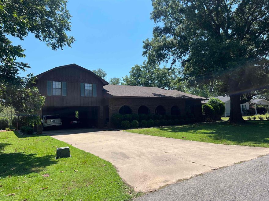 Beautifully Remodeled Waterfront Home in Island Harbor Estates South Experience the perfect blend of comfort, style, and waterfront living in this stunningly remodeled 4-bedroom, 4-bath home located in the highly sought-after Island Harbor Estates South. Boasting fresh paint, new flooring, updated light fixtures, and numerous modern upgrades throughout, this home offers both elegance and functionality. A unique feature of this property is the attached guest suite, located just off the carport. Complete with a full bathroom and its own living/sleeping area, it provides the ideal space for guests or extended family. Enjoy peaceful water views from the enclosed sunroom, an ideal spot for relaxing or watching local wildlife in their natural habitat. Upstairs, the spacious living area is perfect for entertaining and flows seamlessly onto a private balcony that offers breathtaking panoramic views of the water. This property includes a 30x42 workshop on a separate parcel that conveys with the sale, perfect for storage, hobbies, or a home-based business. Boating enthusiasts will appreciate the private boat dock, providing easy access to the water for fishing, cruising, or water sports.