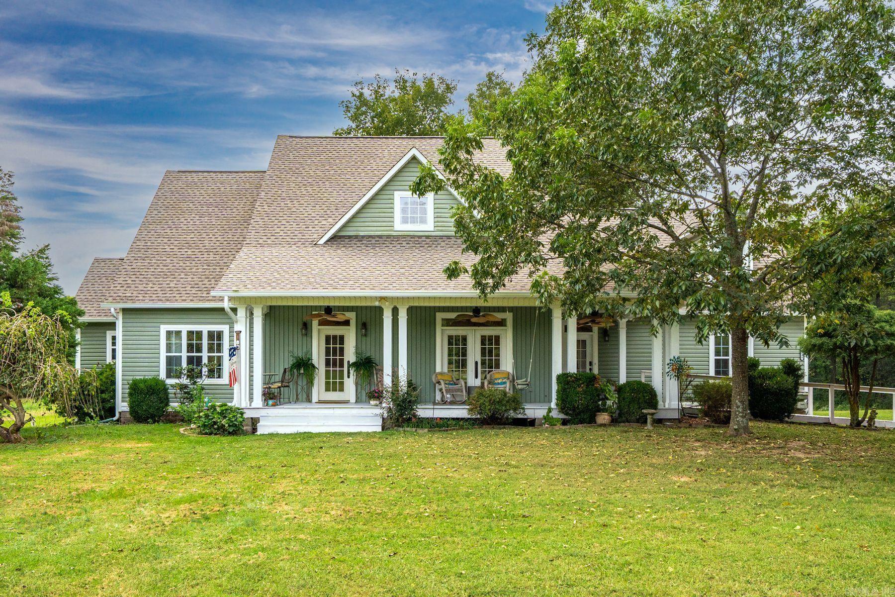 Elegant Country Retreat on 2.66 Private Acres - $675,000 Discover the perfect blend of luxury and tranquility at 4838 Malvern Avenue, where sophisticated farmhouse charm meets modern comfort on 2.66 acres of pristine, level land. This stunning 4,206 square foot home offers an idyllic escape while maintaining convenient access to Hot Springs. Gracious Living: Soaring vaulted ceilings in the living room create impressive grandeur. Gas log fireplace provides cozy ambiance, while the gourmet kitchen delights with granite countertops and professional gas range. Thoughtful Layout: Main level hosts three generously sized bedrooms and 2.5 bathrooms for convenient single-level living. Upstairs features two additional bedrooms, two full bathrooms, and versatile loft/bonus area. Abundant storage and dedicated laundry room throughout. Indoor-Outdoor Living: Charming sunroom for year-round enjoyment and covered porch where you can unwind watching deer roam the property. Level acreage provides endless outdoor possibilities with complete privacy and seclusion. Experience luxury country lifestyle with space, privacy, and pastoral beauty. Additional adjacent acreage available.