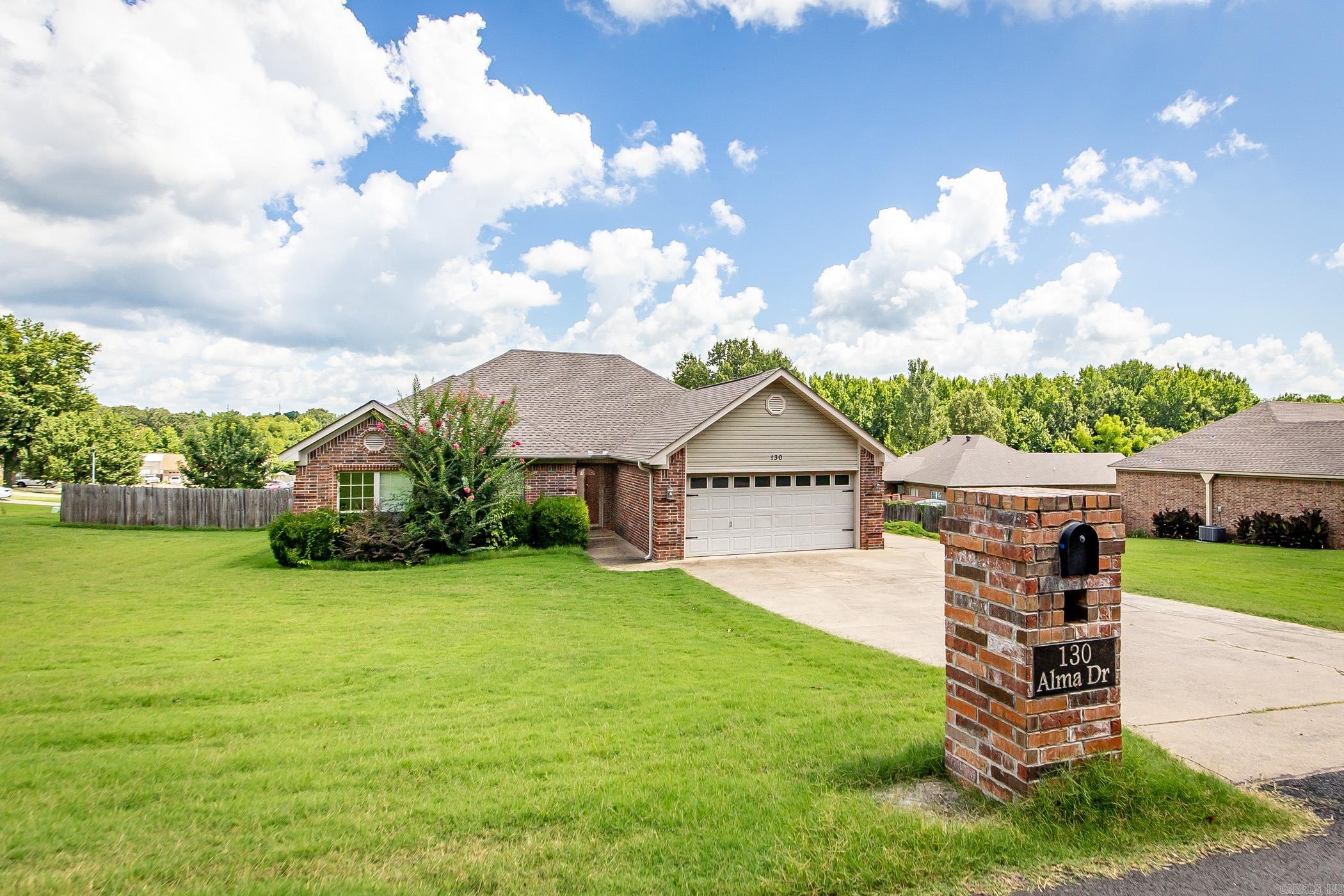 An outdoor entertainment area worthy of all the awards. This home sits on approx half an acre corner lot. Close and convenient to the interstate for easy commute. This home offers an open and split floorplan. The kitchen has a breakfast bar, granite countertops with tiled backsplash, stainless appliances, built in microwave, and so much more. The openness of the living area and the large outside covered deck offer so much entertaining space for everyone to enjoy your home. Fully fenced backyard and so much more. Call today for your private showing.