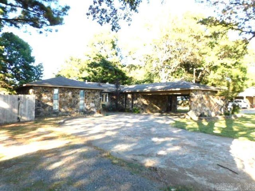 This Home Is Brimming With Potential! A Very Spacious Home Indeed! 3 Bedrooms In All With One Being The Primary Bedroom As It Has The Attached Bathroom, Another Bathroom Off The Hallway, An Additional Room That Is The Perfect Size For Home Office/Study. A Large Livingroom With Fireplace, Dining/Kitchen Complete The Rooms Layout. Home Is Situated On A Large Corner Lot With The Back Yard Being Fenced In-Would Make A Great Place To Call HOME!!  Bring You Offers  Offers To Be Submitted Through www.propoffers.com