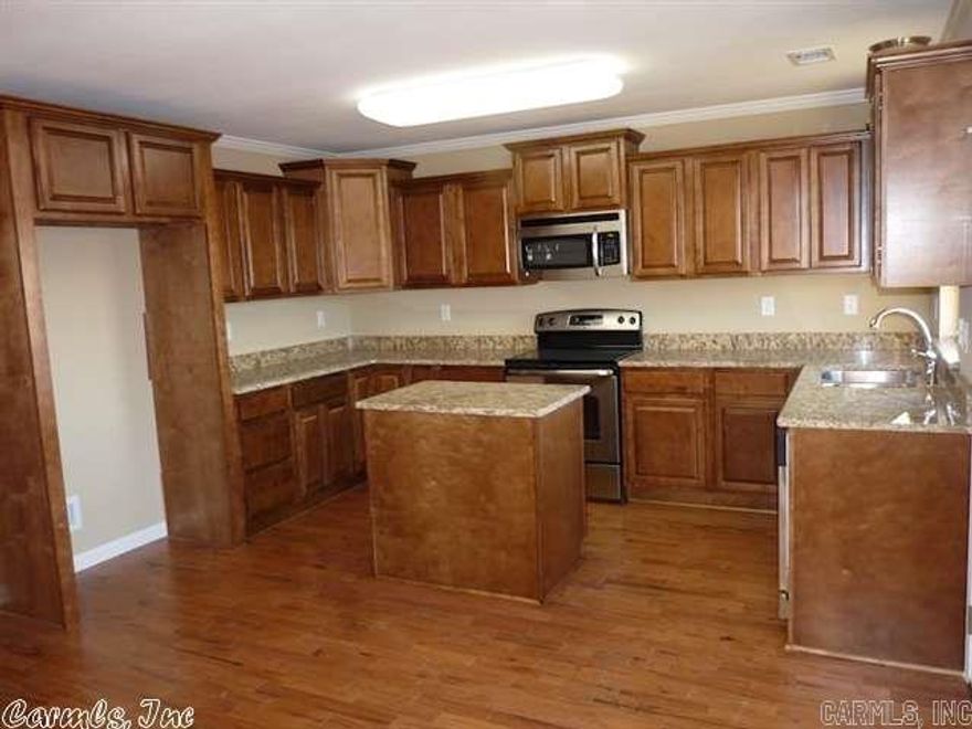 Open floor plan, nice 3 Bedroom, 2 Bath home with wood floors, tile in wet areas, separate laundry room and fenced backyard. Available now