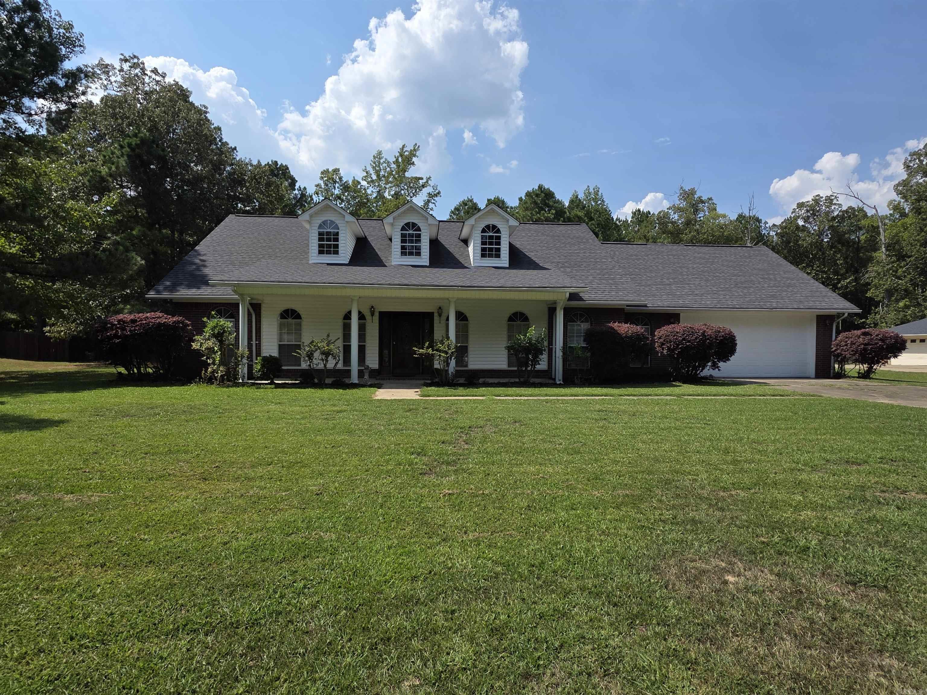 Take a look at this beautifully updated home in a country setting at the edge of town! It has peaceful surroundings with no neighbors to the rear for you to enjoy. The inside features some new appliances and granite countertops. There is also new paint and flooring in most of the house. Come take a look and fall in love!