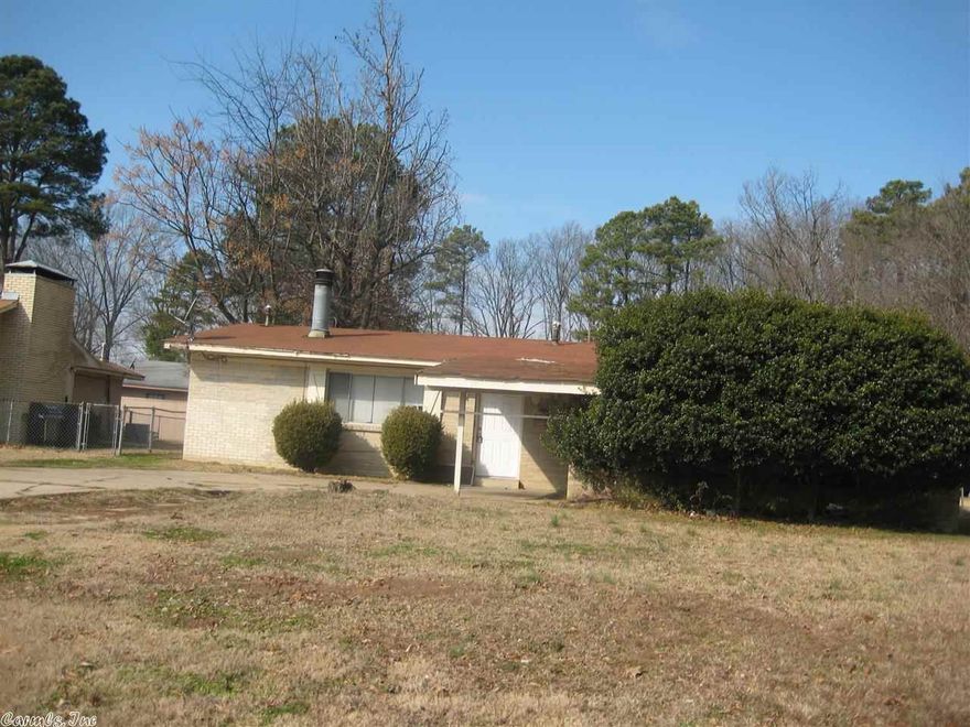Great area in SWLR; Home is at end of main street and located in dead end on corner lot; Home being sold "AS IS" Inspections are welcome; 3BDRM;1BTH flooring is tile thru out home; LR (has Fpl)is separate from Kitchen and Dining combo;EZ maintenance with brick on exterior; Covered porch with carport;Large flat back yard partially fenced. EZ to see just call! Vacant! Has COMBO must call for combo!