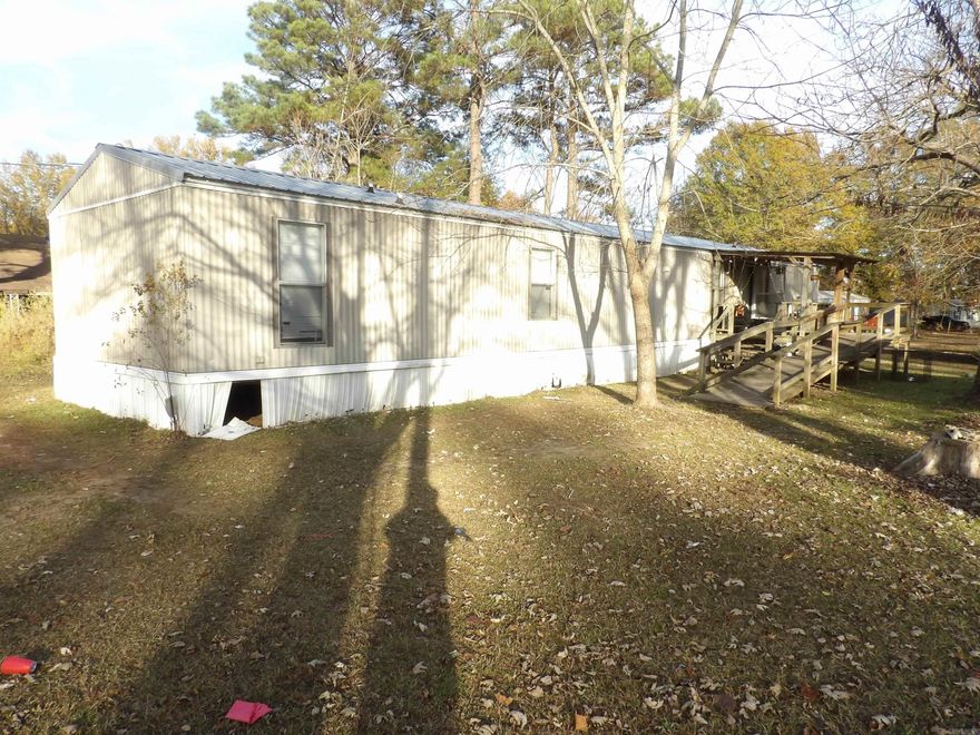 Great investment opportunity!  This listing includes .46 acres with two mobile homes on the property and a storm shelter.  The first is a 16X80, 2002 model the second is a 12X48, 1968 Model. Both are currently rented and income producers!