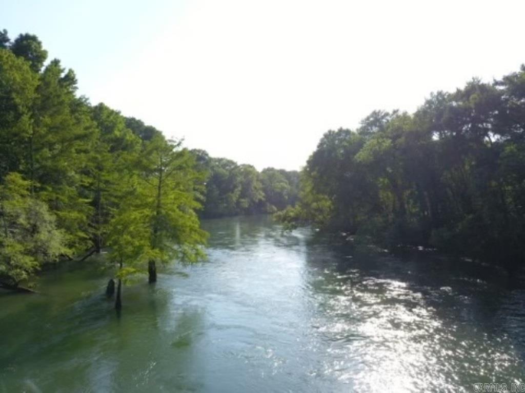 F0R SALE in White County AR (Pangburn) 495ac m/l large hay fields or fenced for cattle. Highway frontage on 124. Highly developable shoreline on the Little Red River, between a mile to a mile and one-half shoreline. 10.74ac m/l on Ernie Atkins Rd. with older house, 43.14ac m/l on Ernie Atkins Rd. These two properties are included in the total acres.