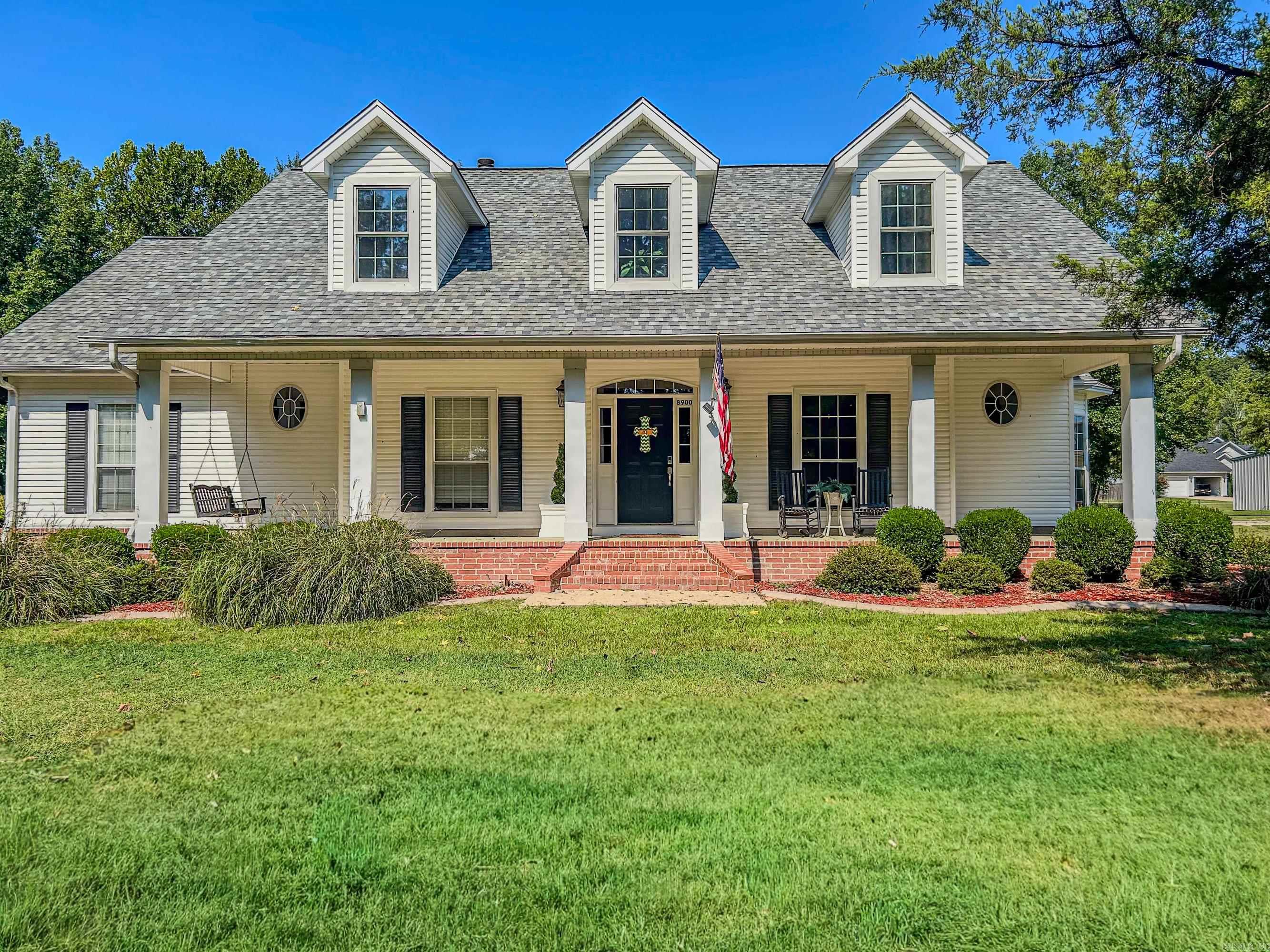Gorgeous country home on 1.45 acres. 4 bedroom, 4 bath. Great room with fireplace is open to kitchen and dining area. Kitchen has been totally updated. Formal dining room. 3 bedrooms downstairs, 1 bedroom up. I bath up. Great living space/bonus upstairs. Laundry room has sink, shower and toilet available for showering after work outside. Screened in porch off great room. Shop and RV cover with extra outside storage building. Watch the deer from the front porch or grape arbor. Front porch swing does not convey.